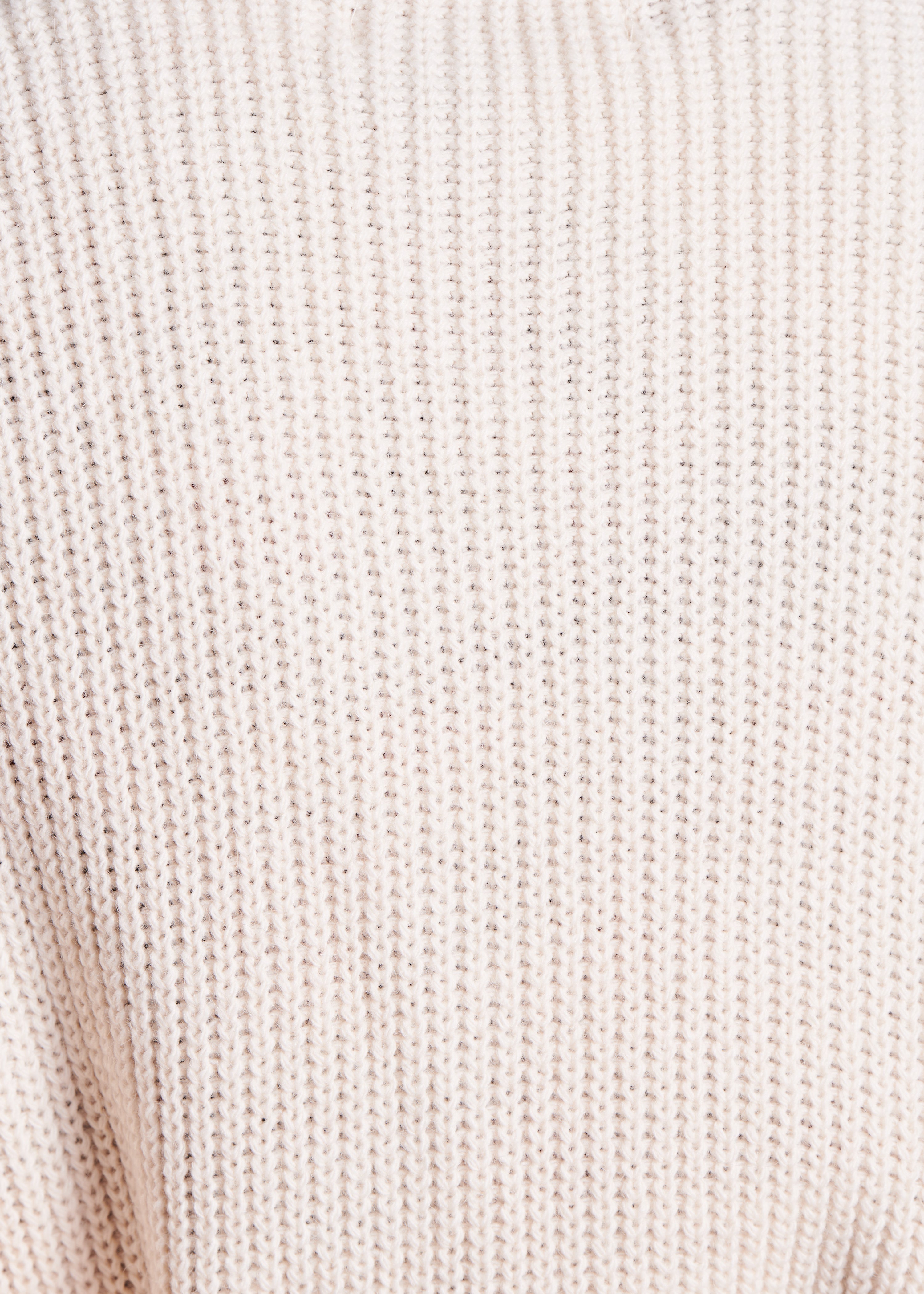 Ecru sleeveless turtleneck sweater