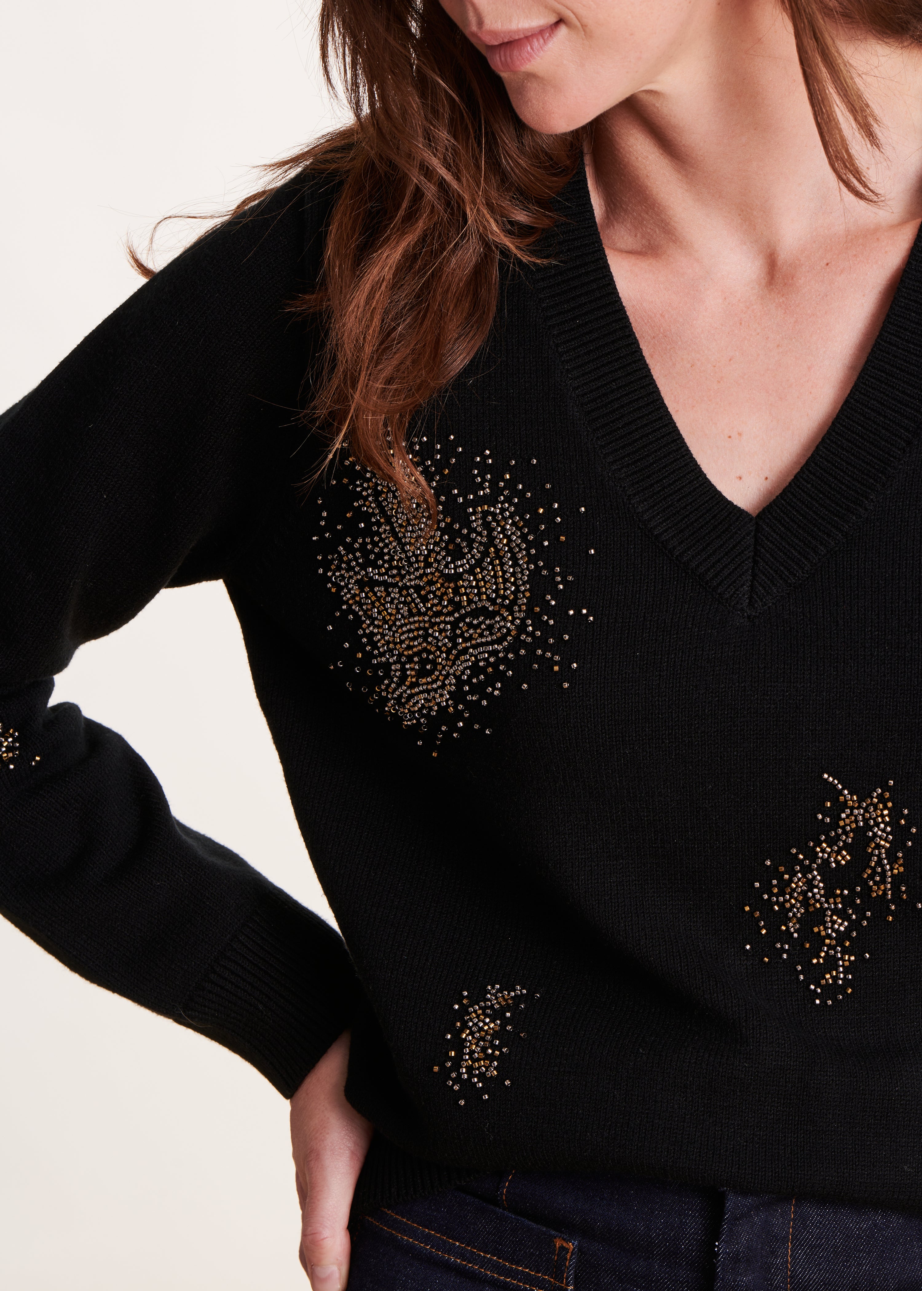 black sequined V-neck sweater