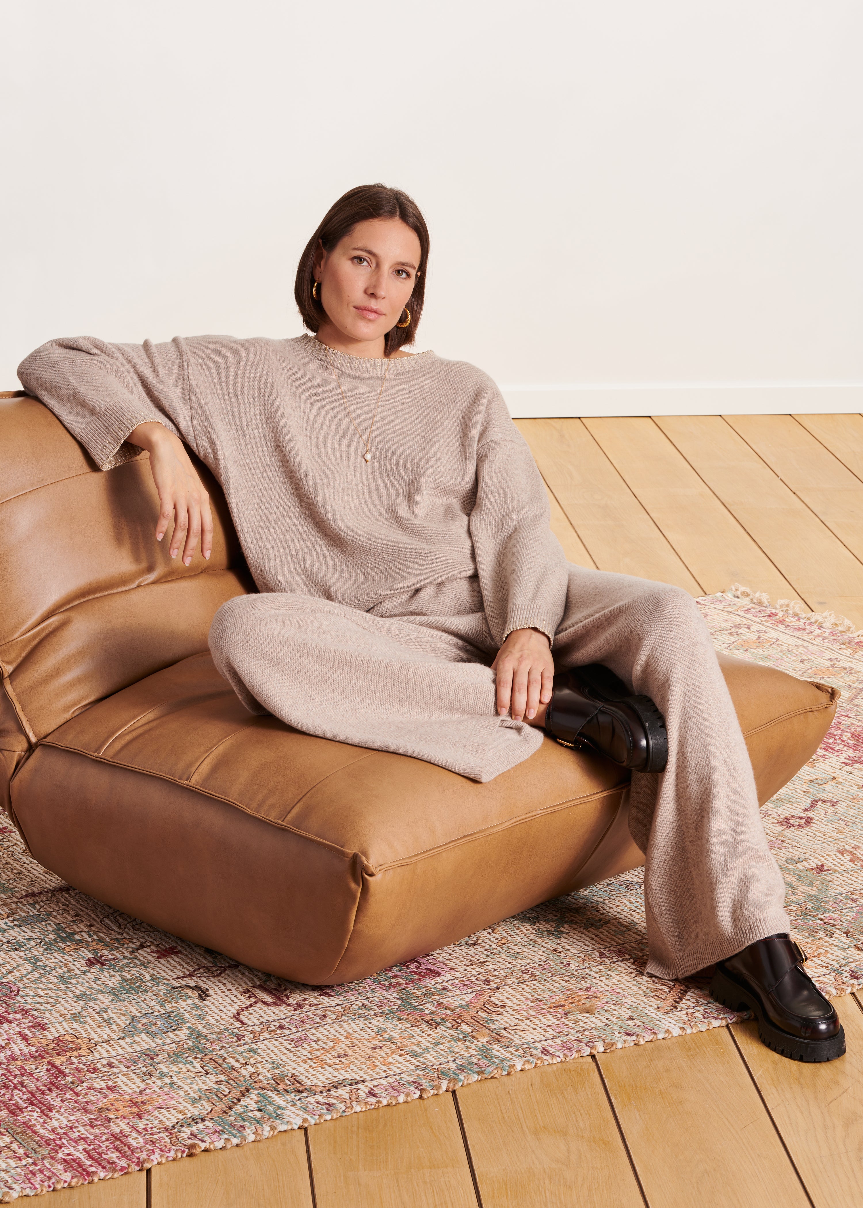 Loose beige jumper in soft knit with boat neckline