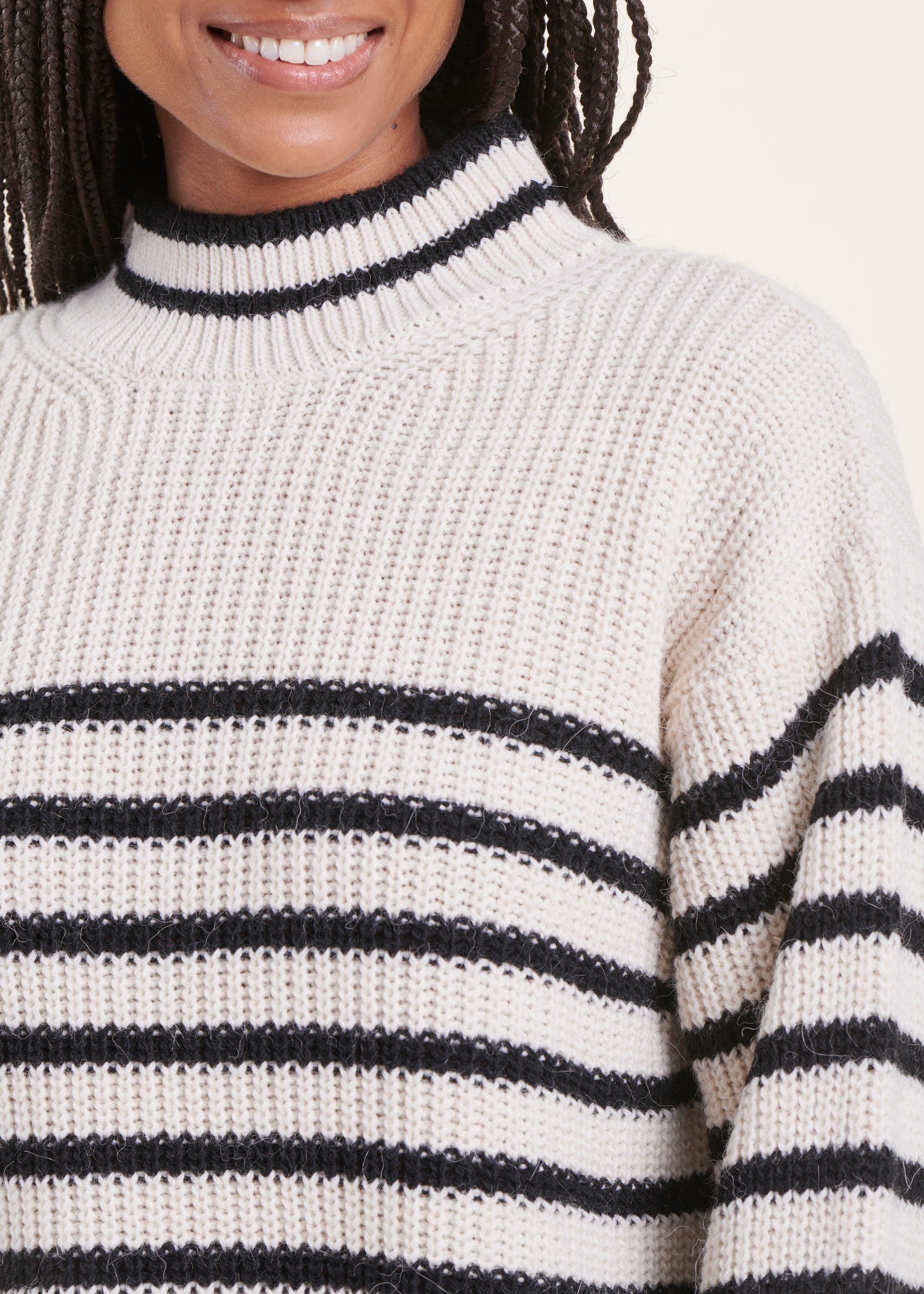 black and white jumper with stand-up collar