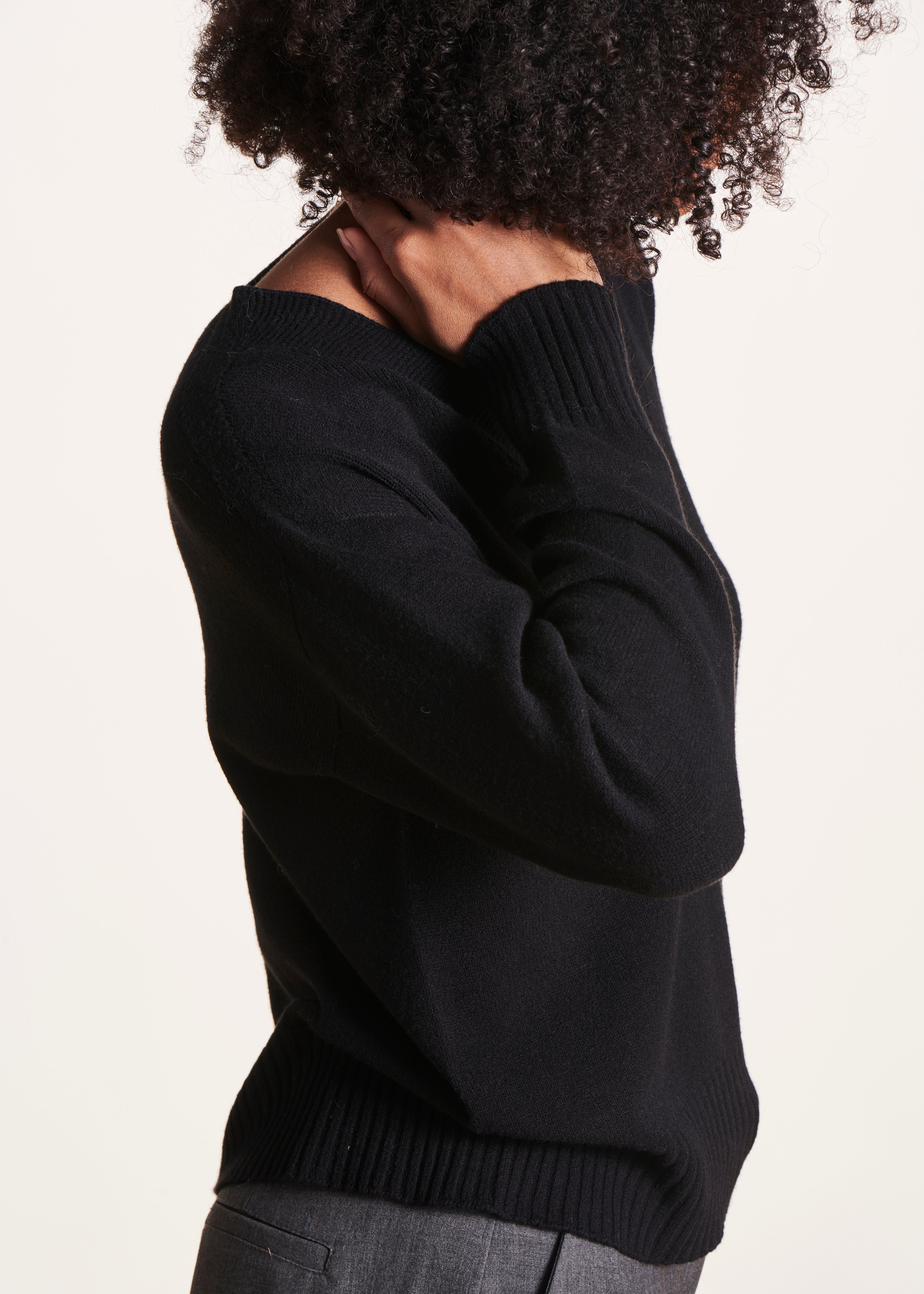 Straight black V-neck jumper