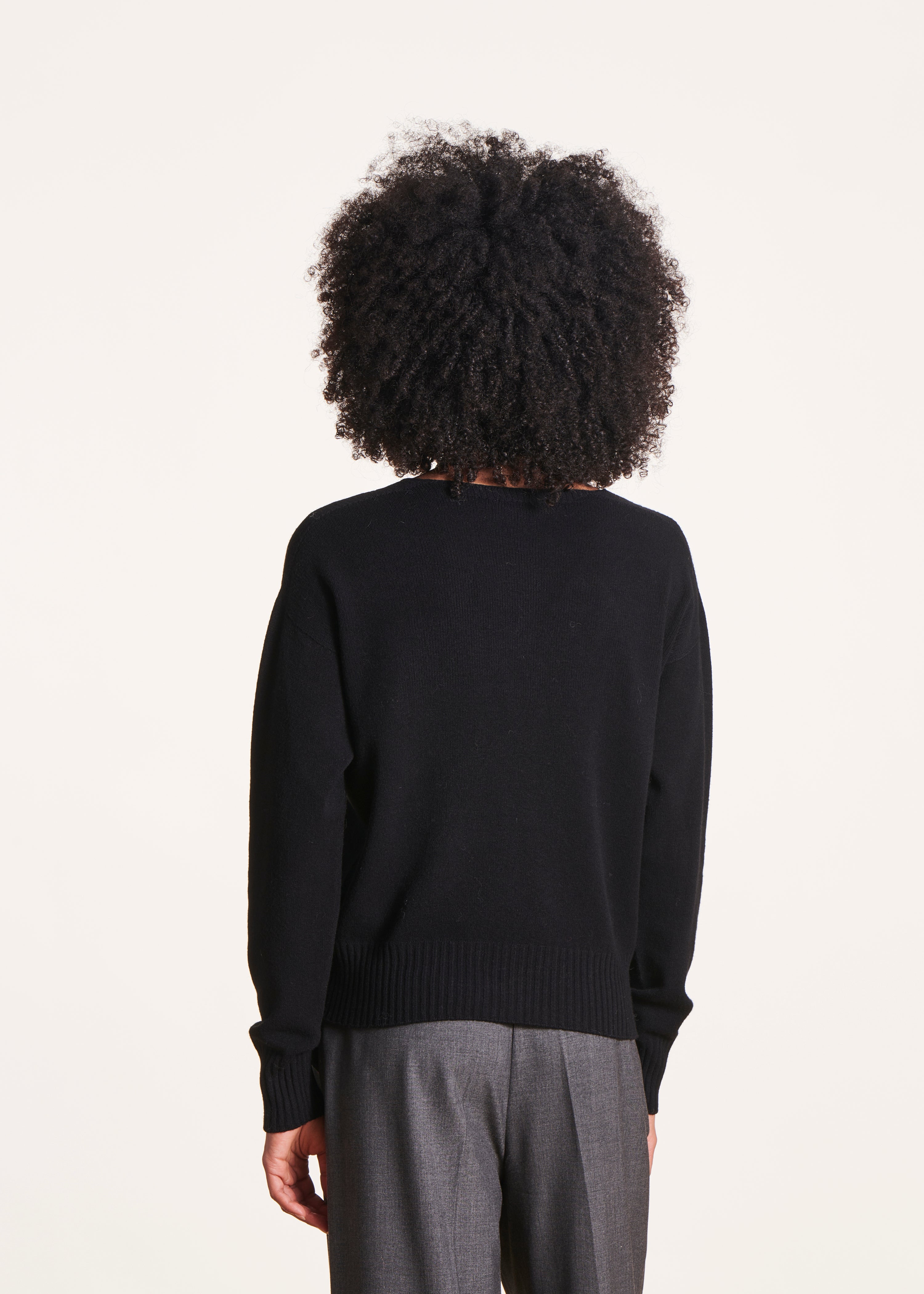 Straight black V-neck jumper