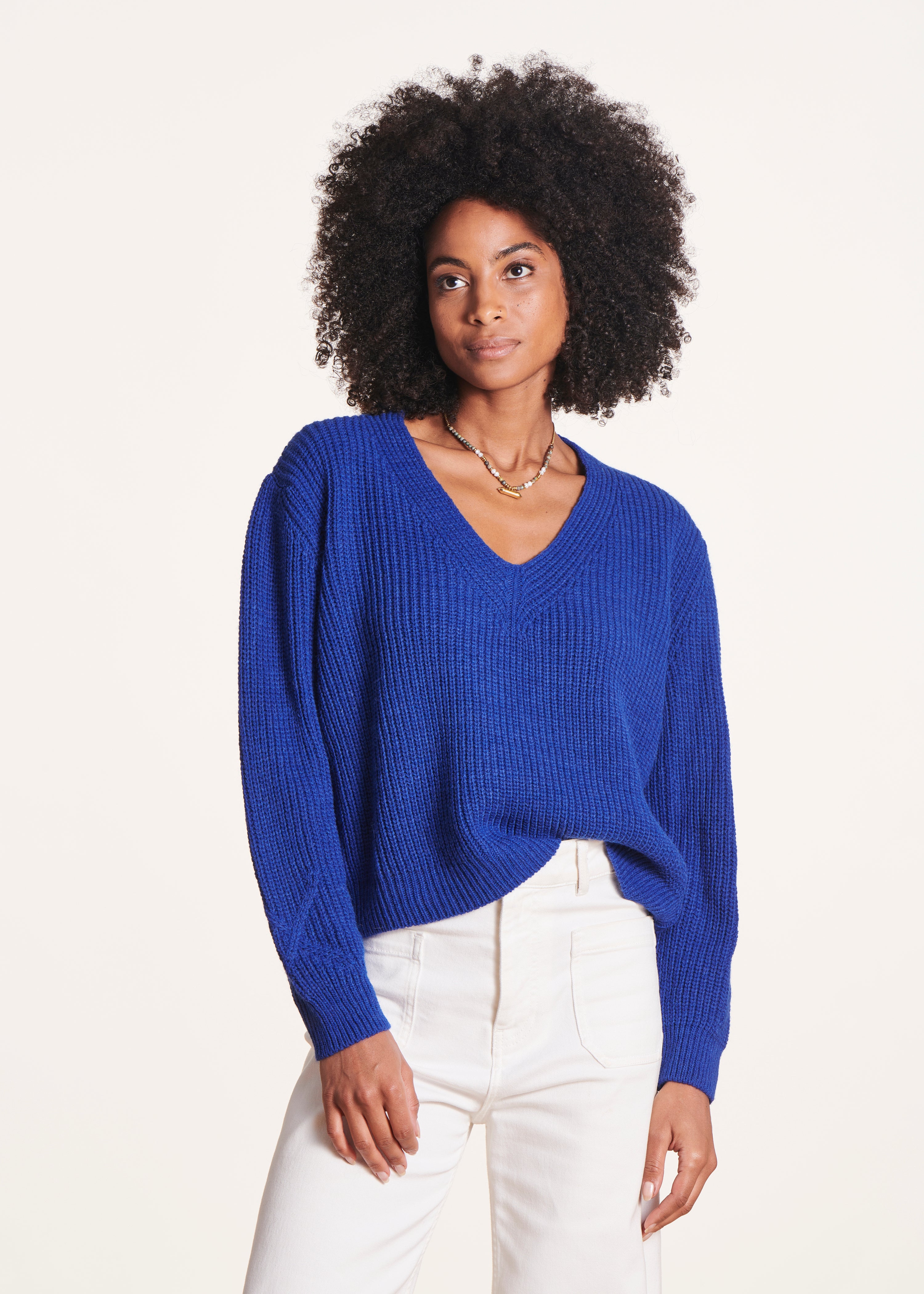 Short blue V-neck sweater