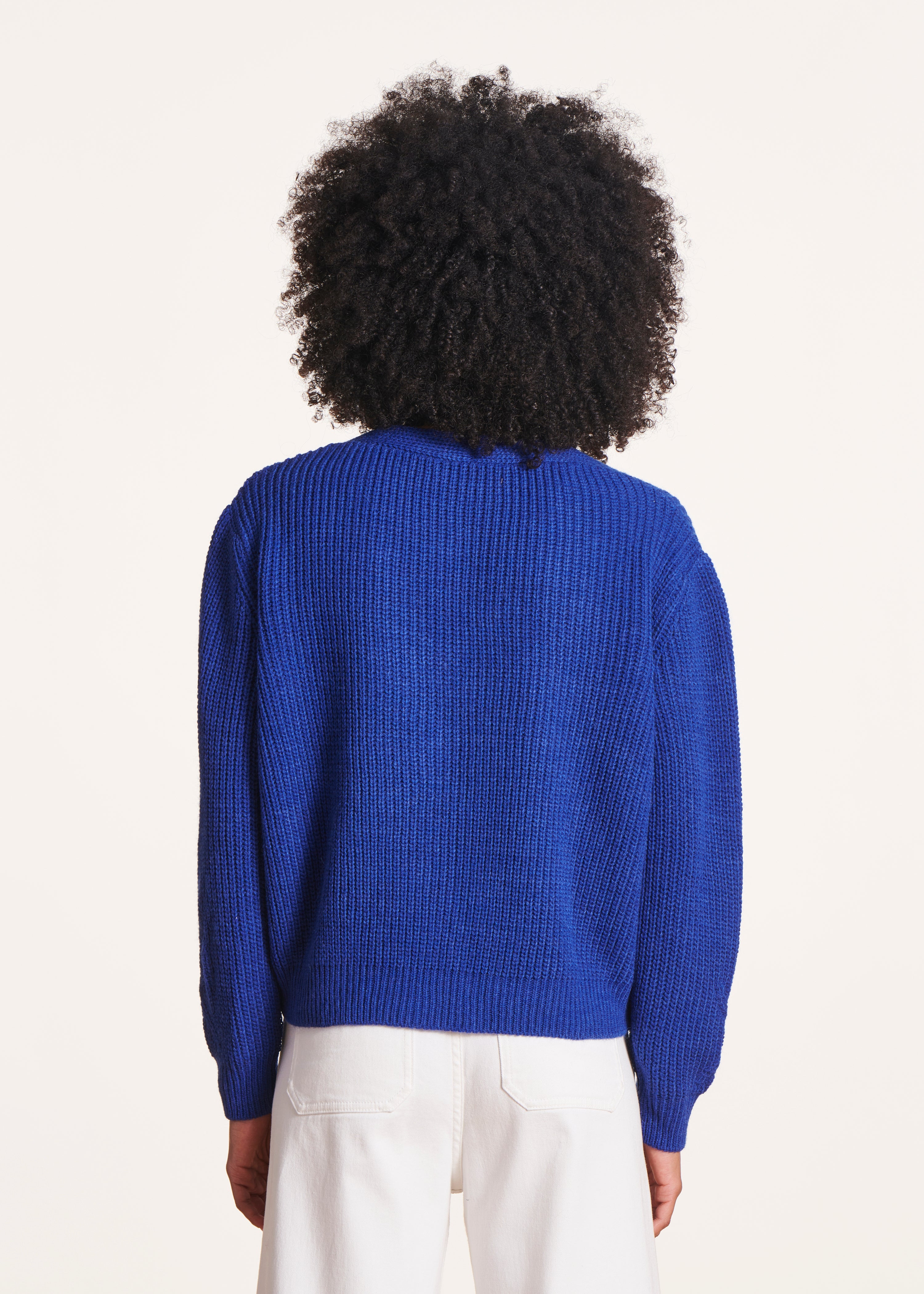 Short blue V-neck sweater