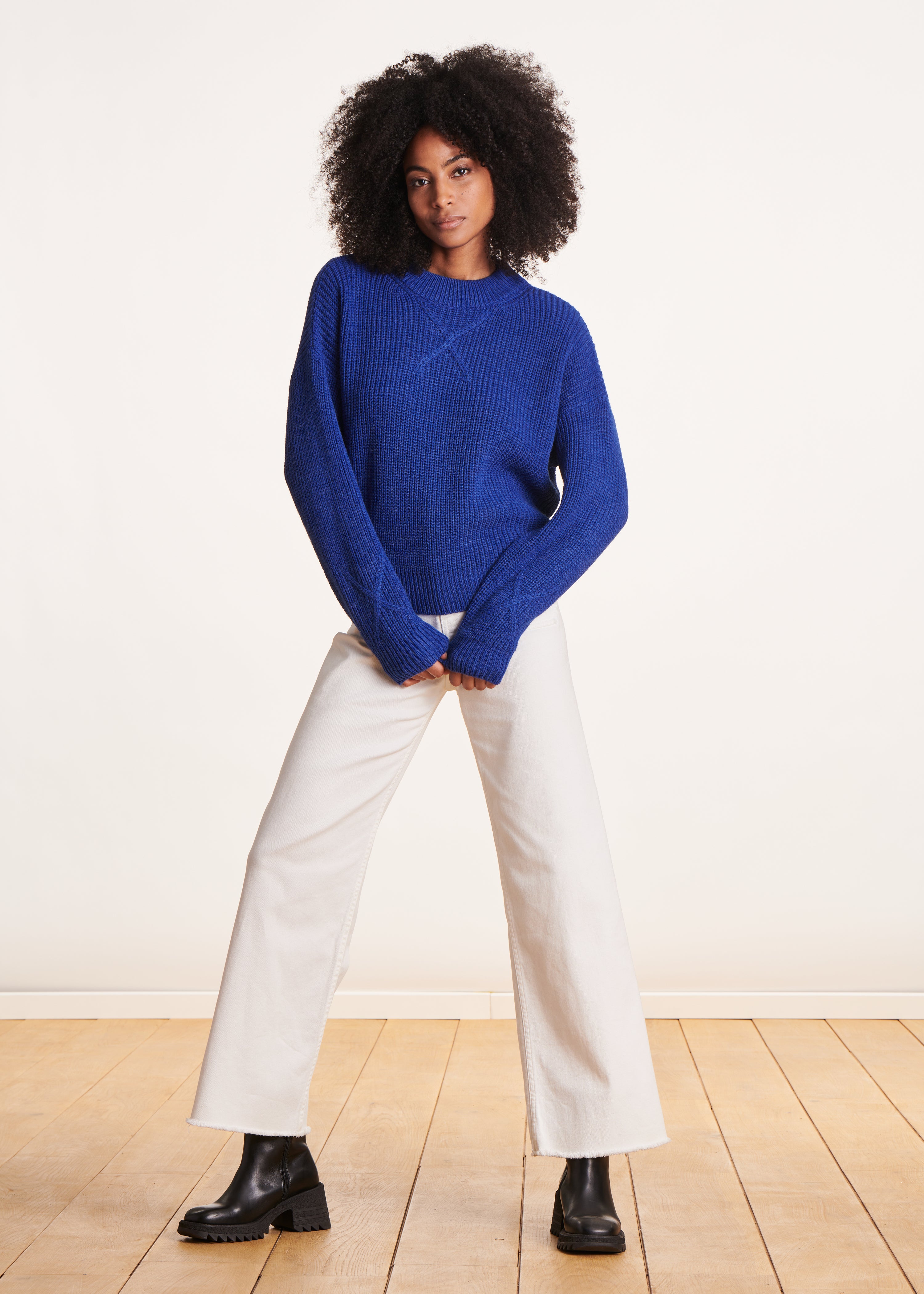 Blue high-neck sweater in beaded rib knit