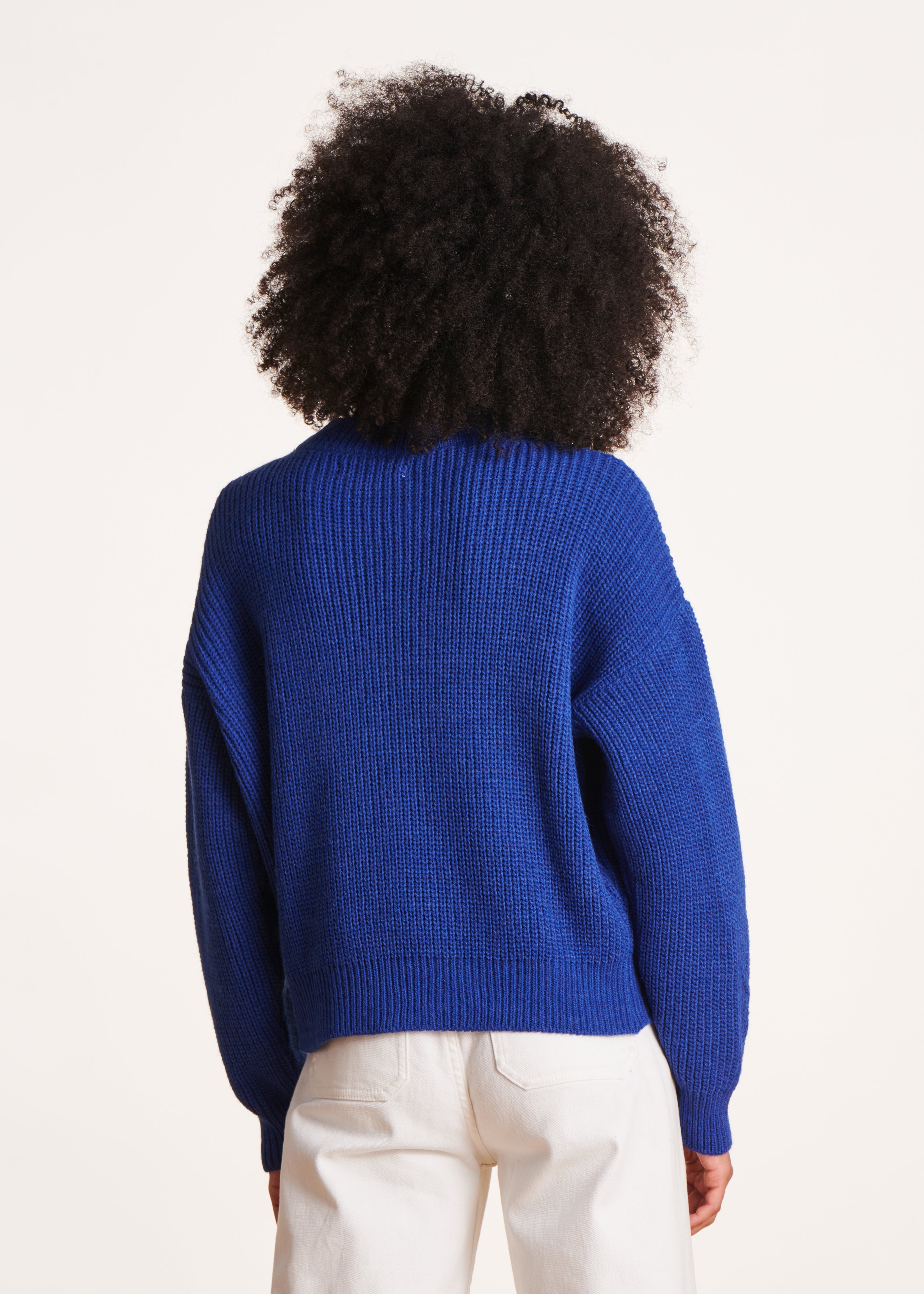 Blue high-neck sweater in beaded rib knit