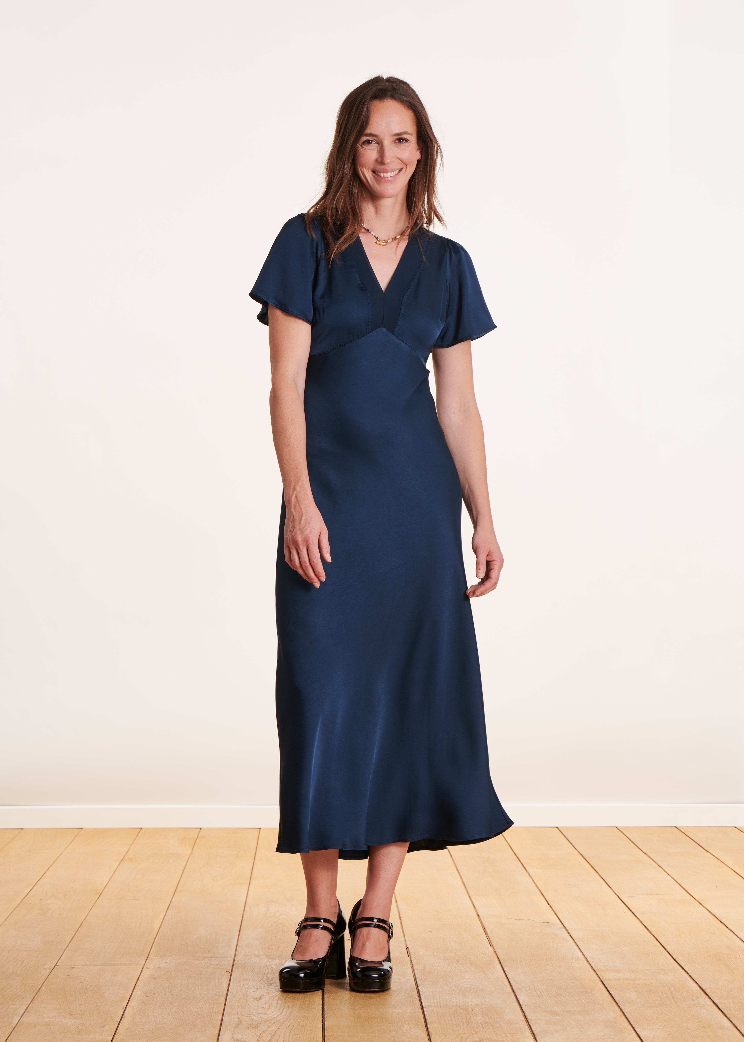 Slim-fit long dress in petrol blue with short sleeves