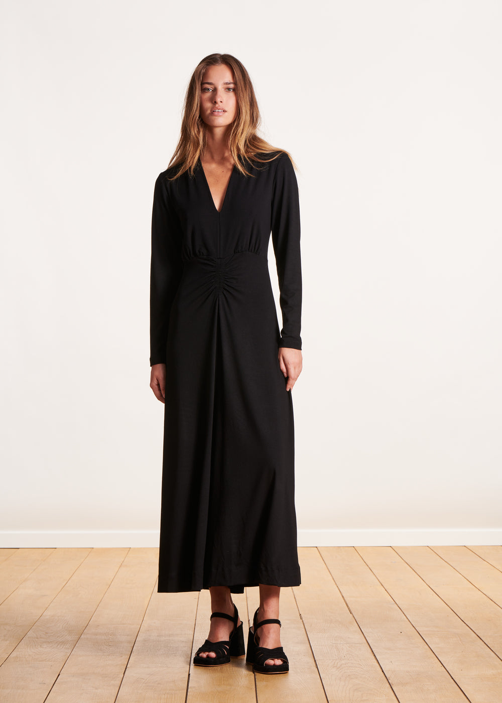 Black fitted V-neck mid-length dress