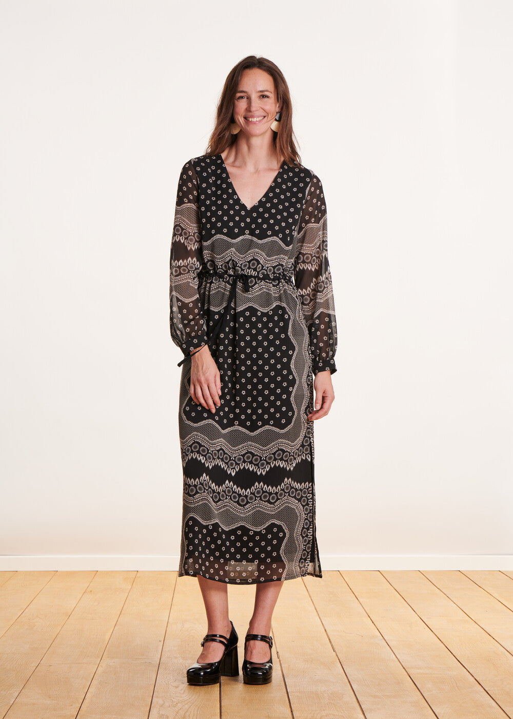 Black flowing long dress with long sleeve print