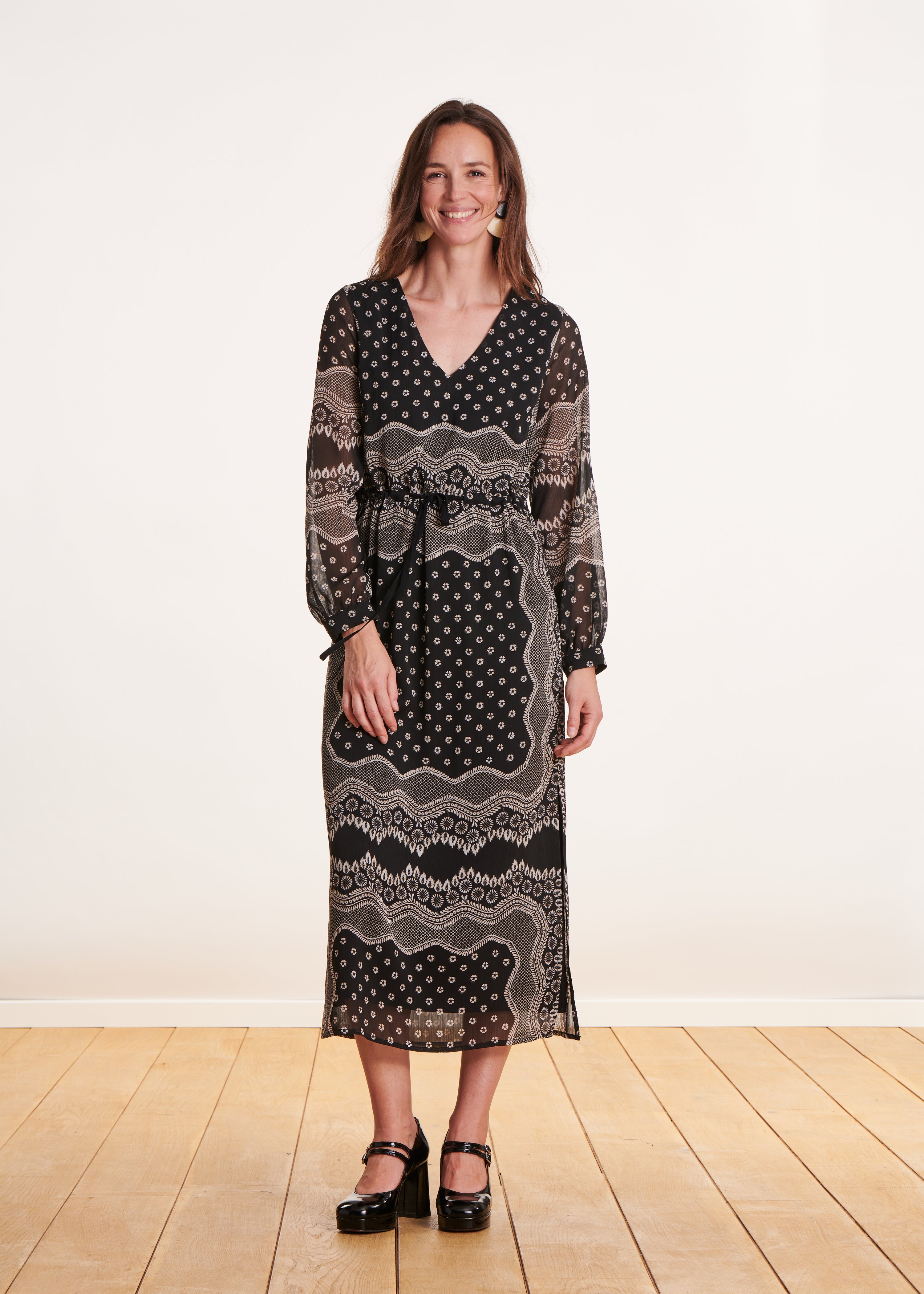 Black flowing long dress with long sleeve print