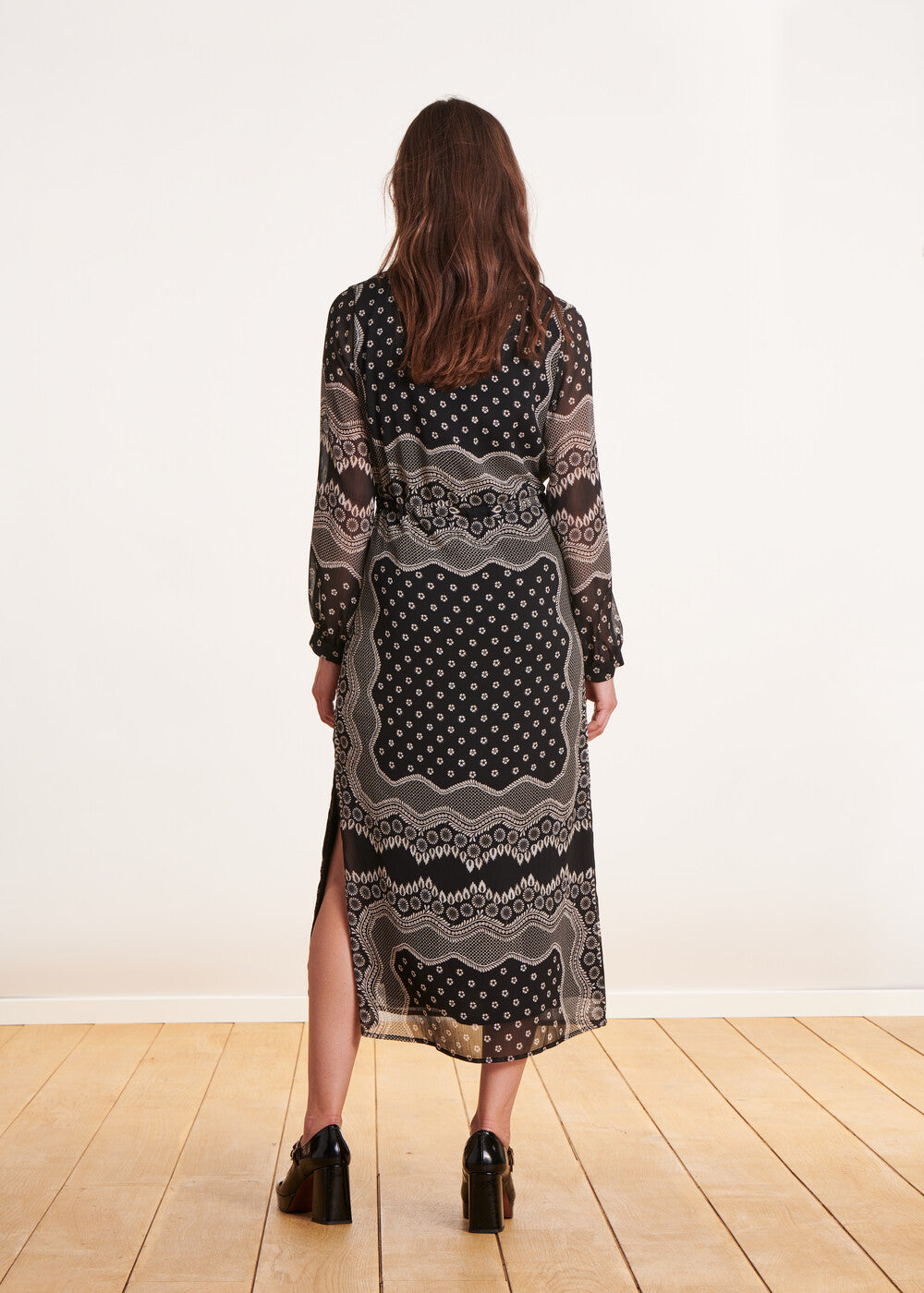 Black flowing long dress with long sleeve print