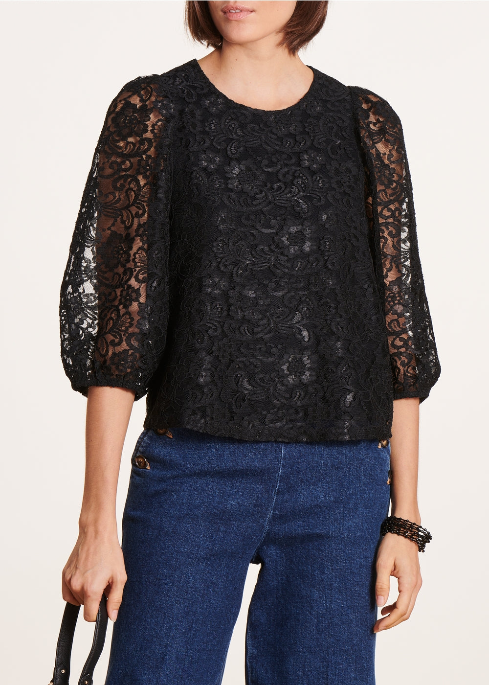 Schwarze, weite Bluse aus Spitze
