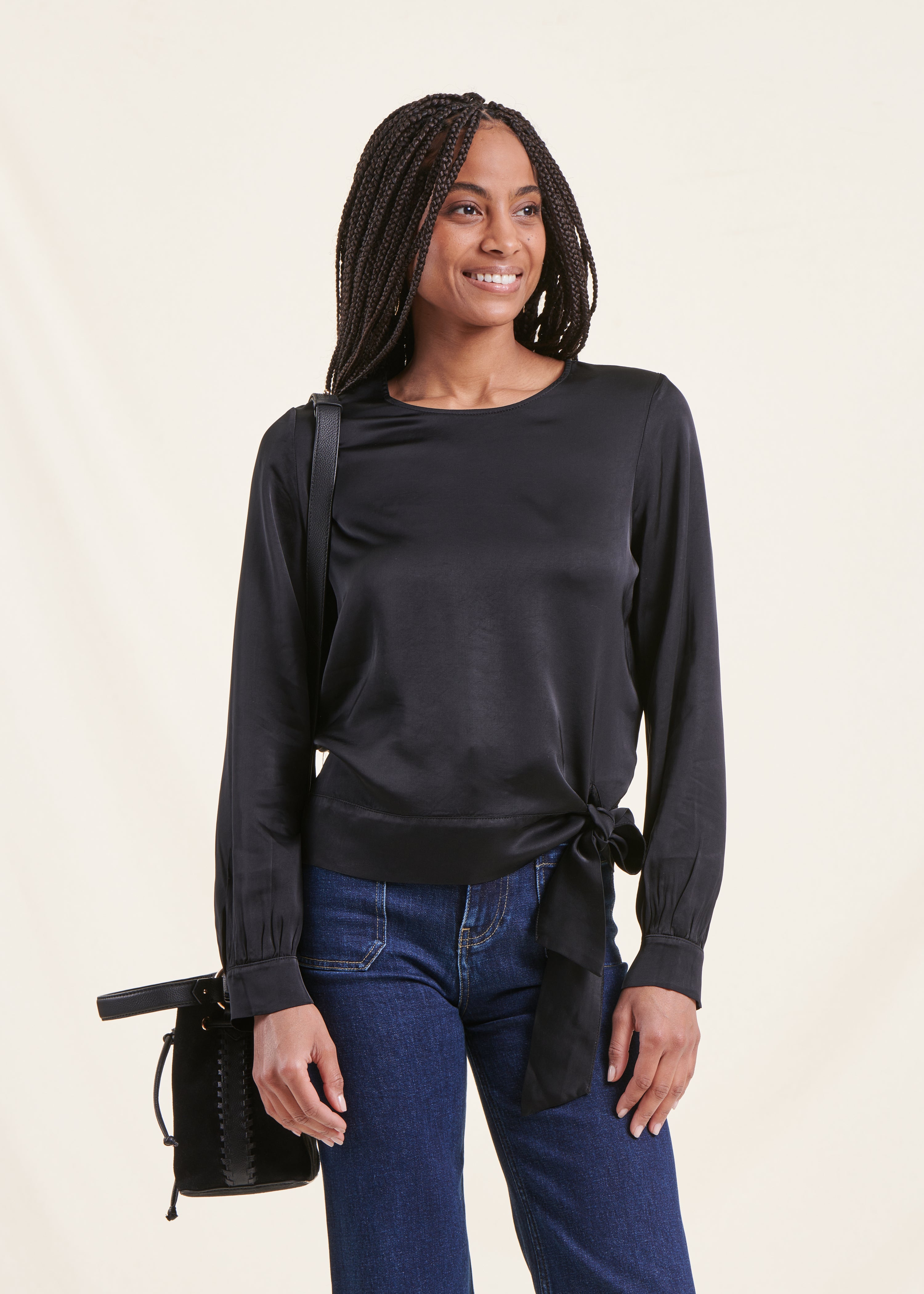 Loose and flowing black top with long sleeves