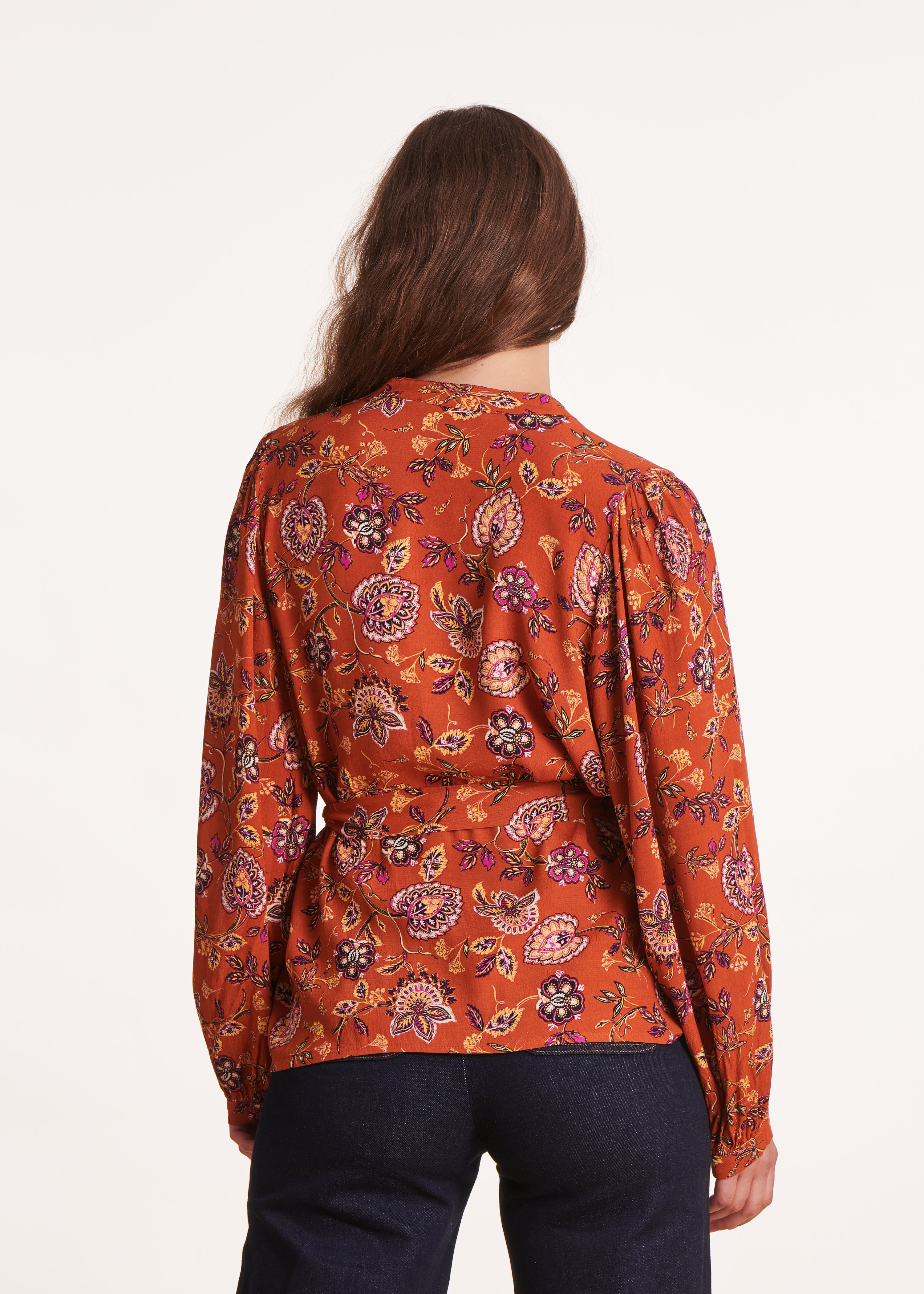 Loose orange top with floral print