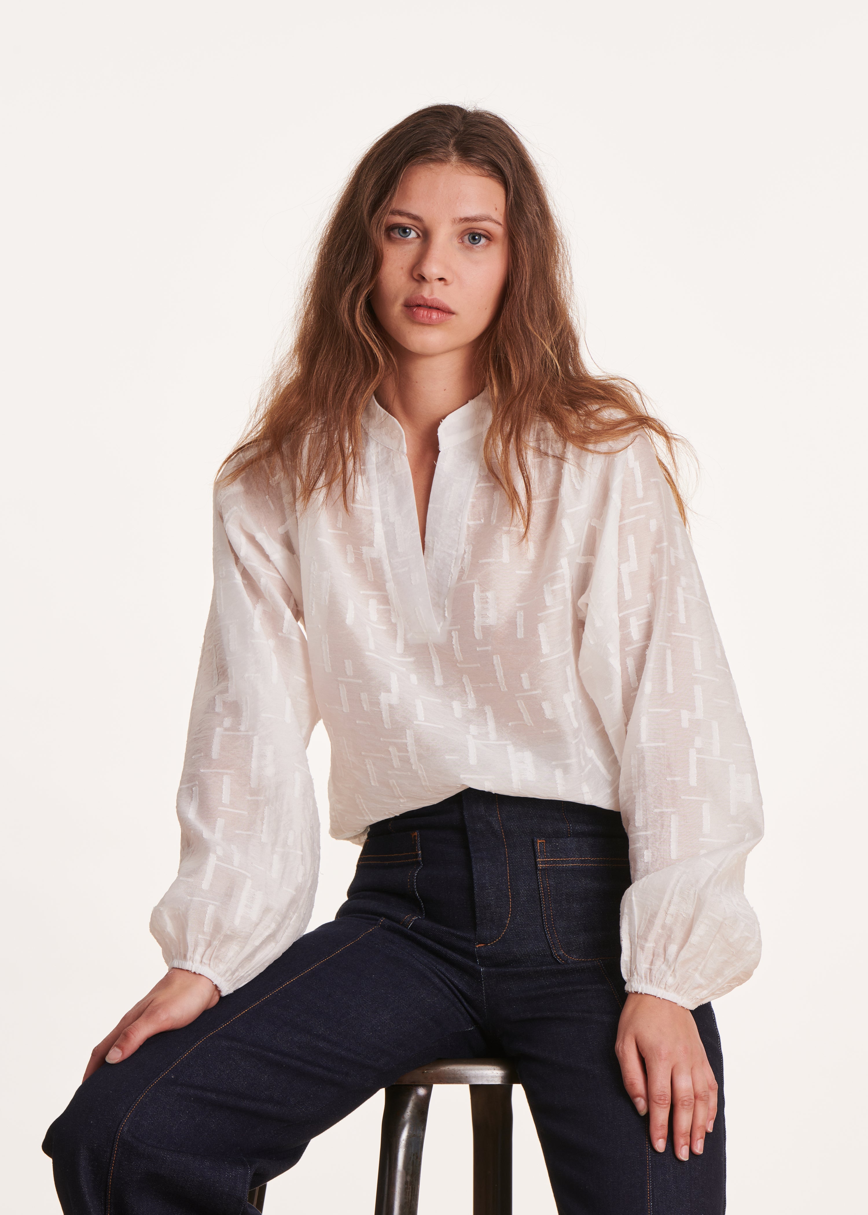 Loose-fitting long-sleeved white voile top