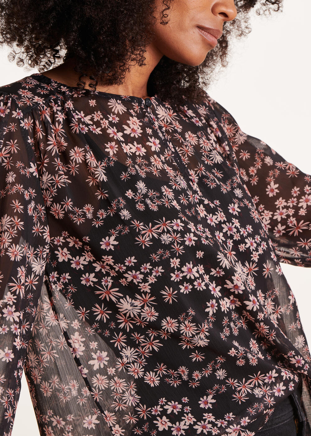 Loose black top with flower print