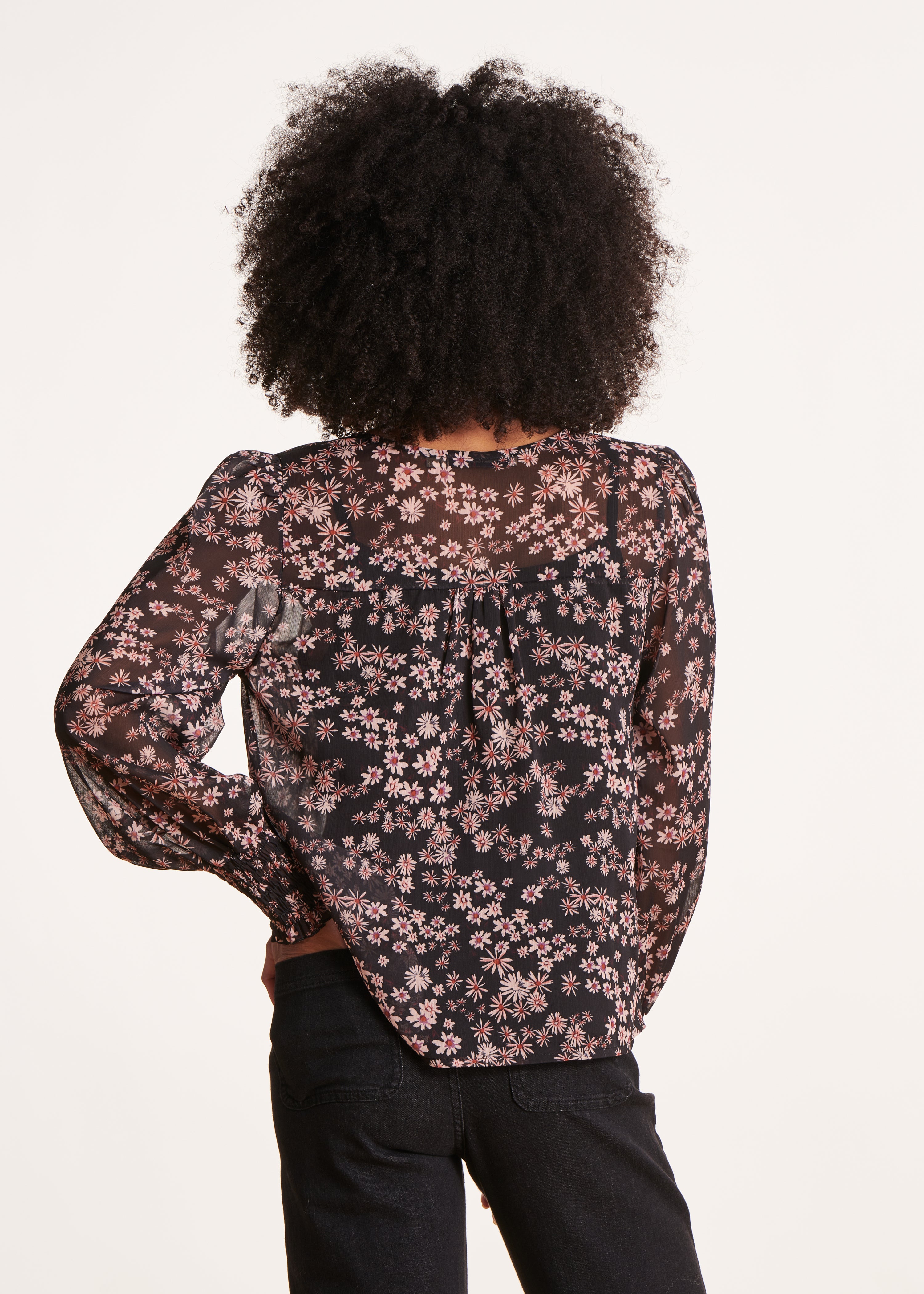 Loose black top with flower print