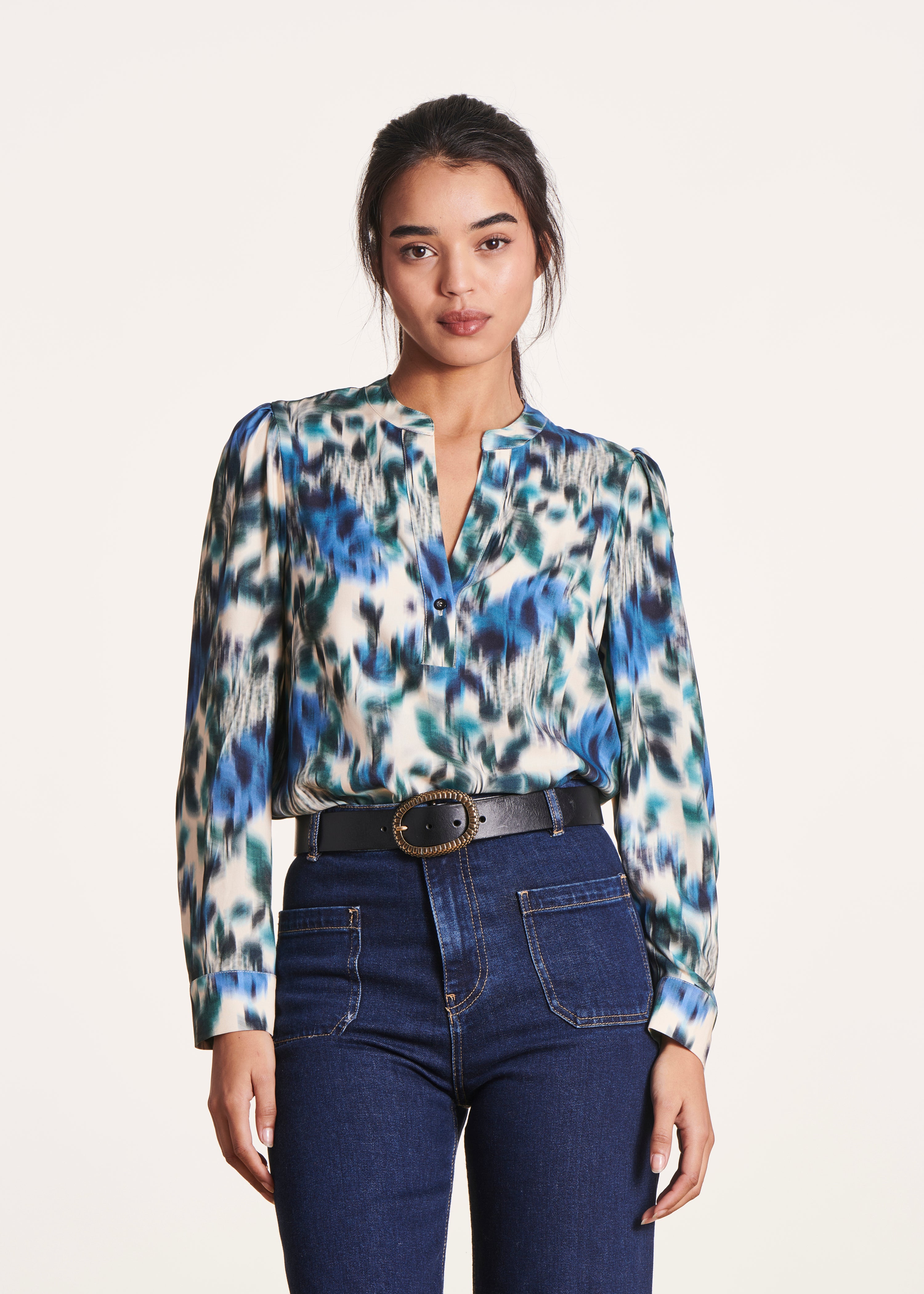 white and blue print long-sleeved top