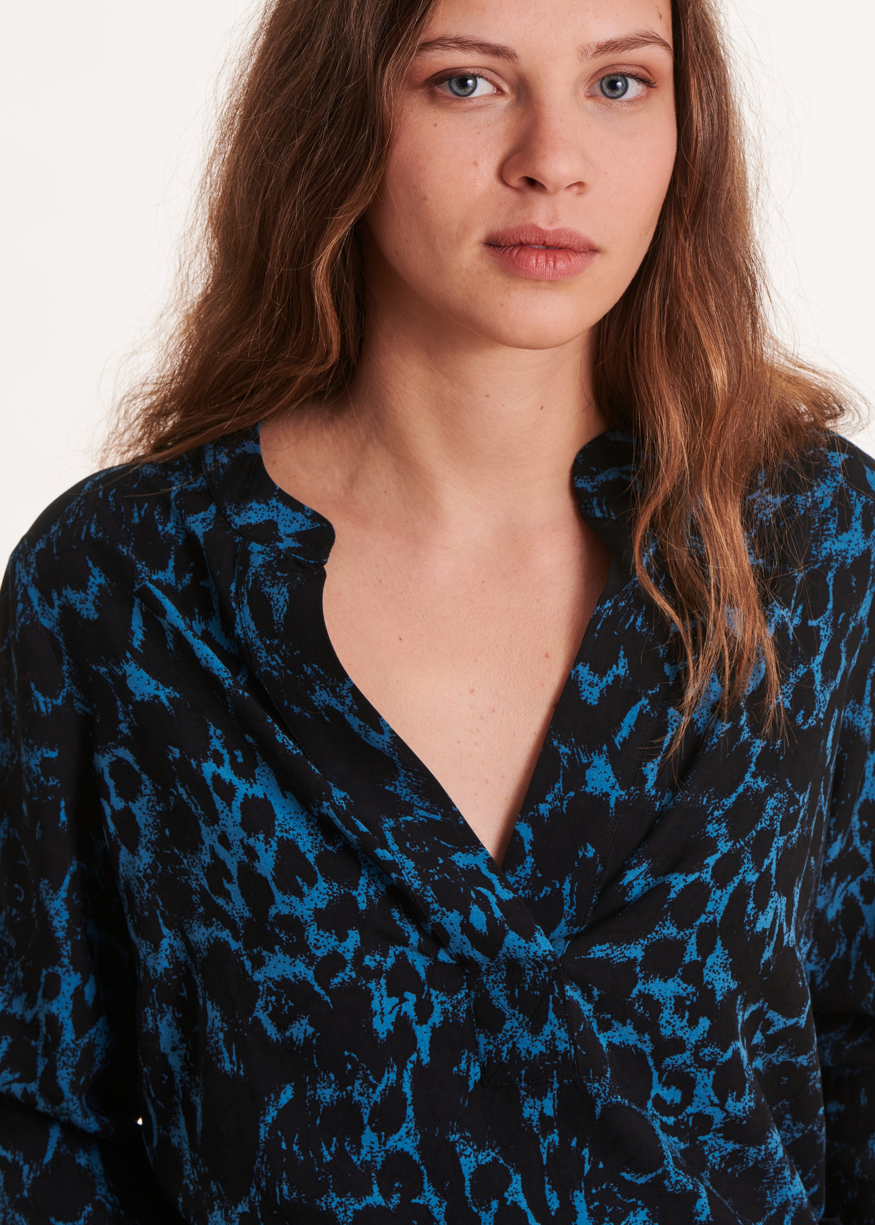 Blue and black animal print top