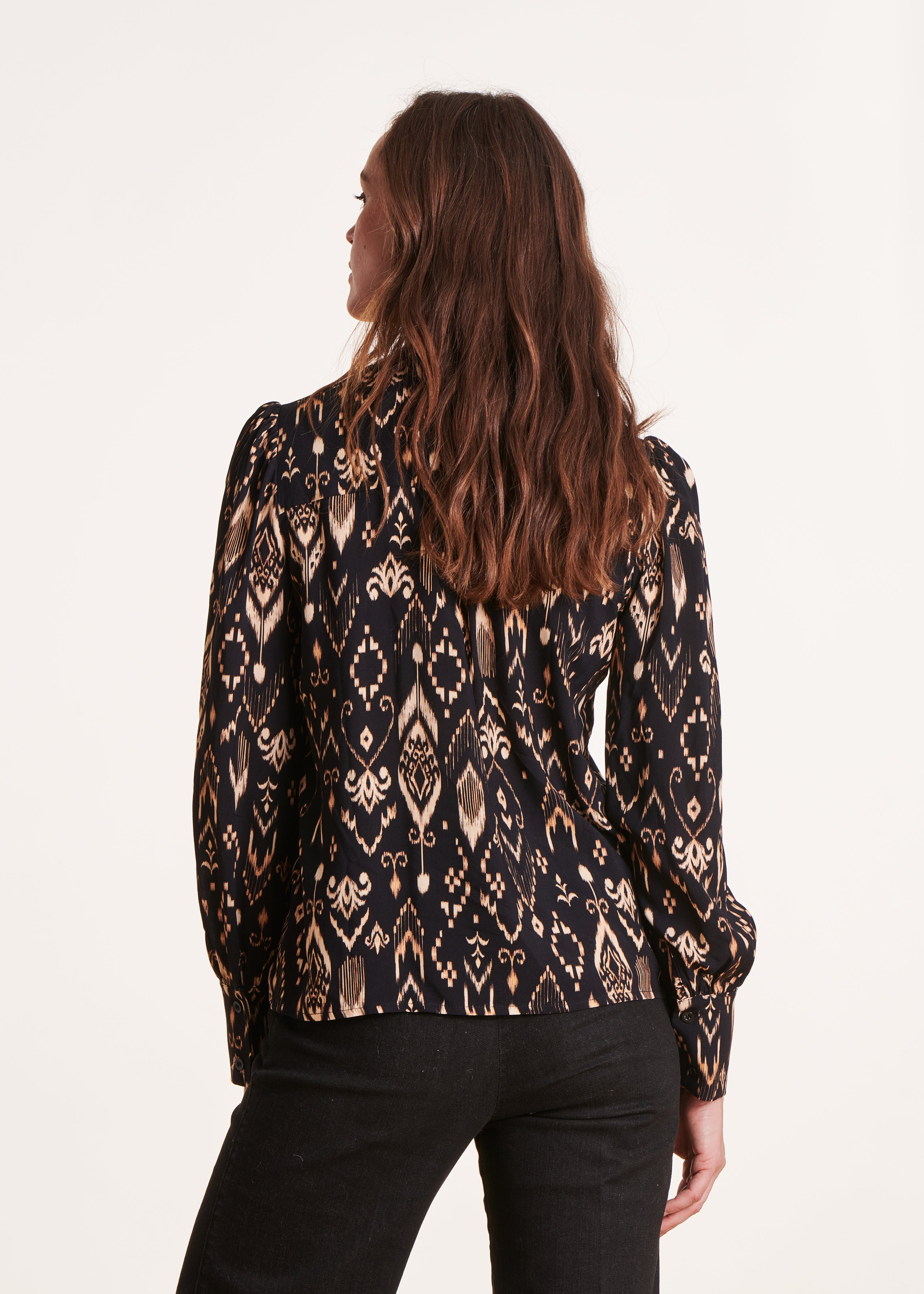 black buttoned top with Tunisian neckline print