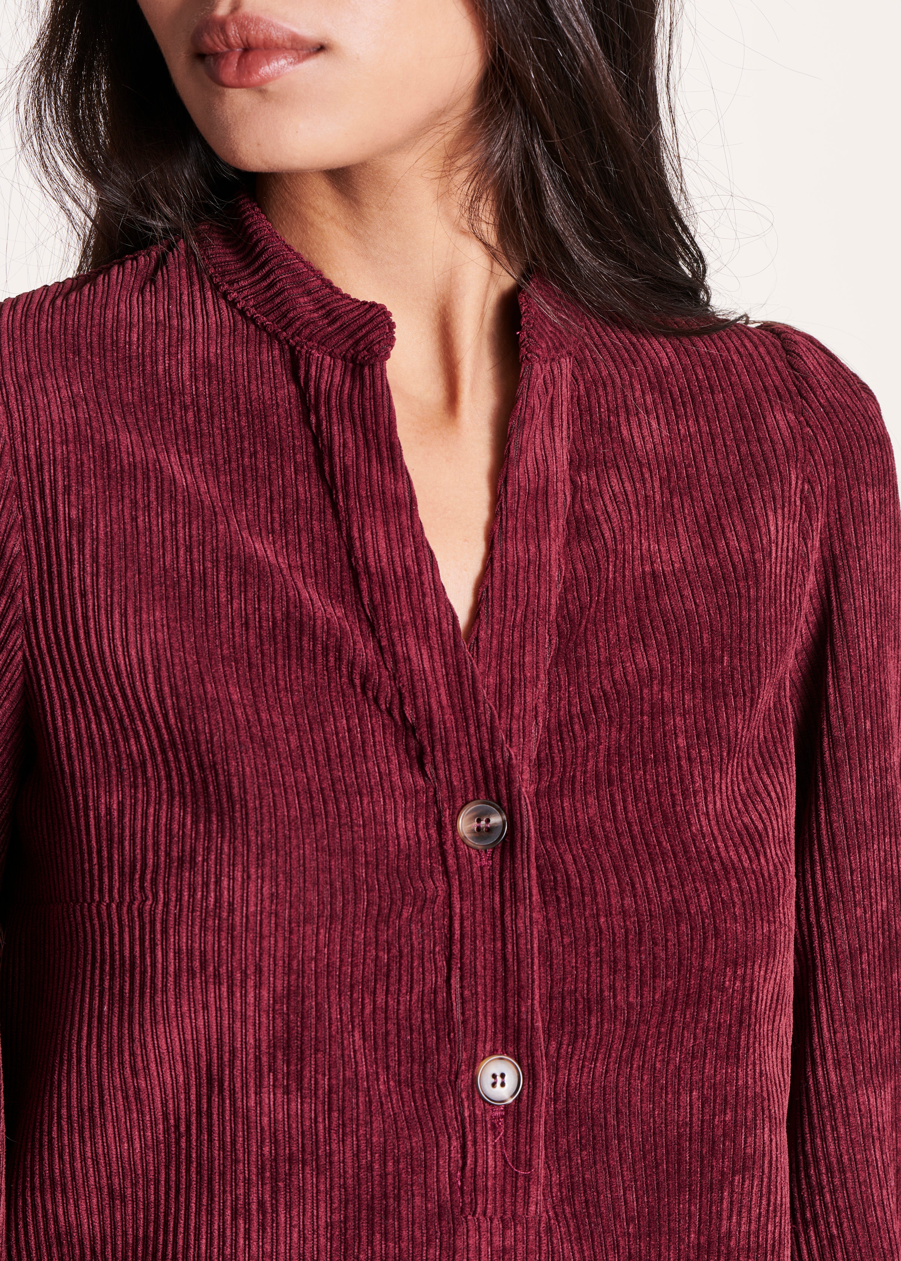 Burgundy top with long puff sleeves