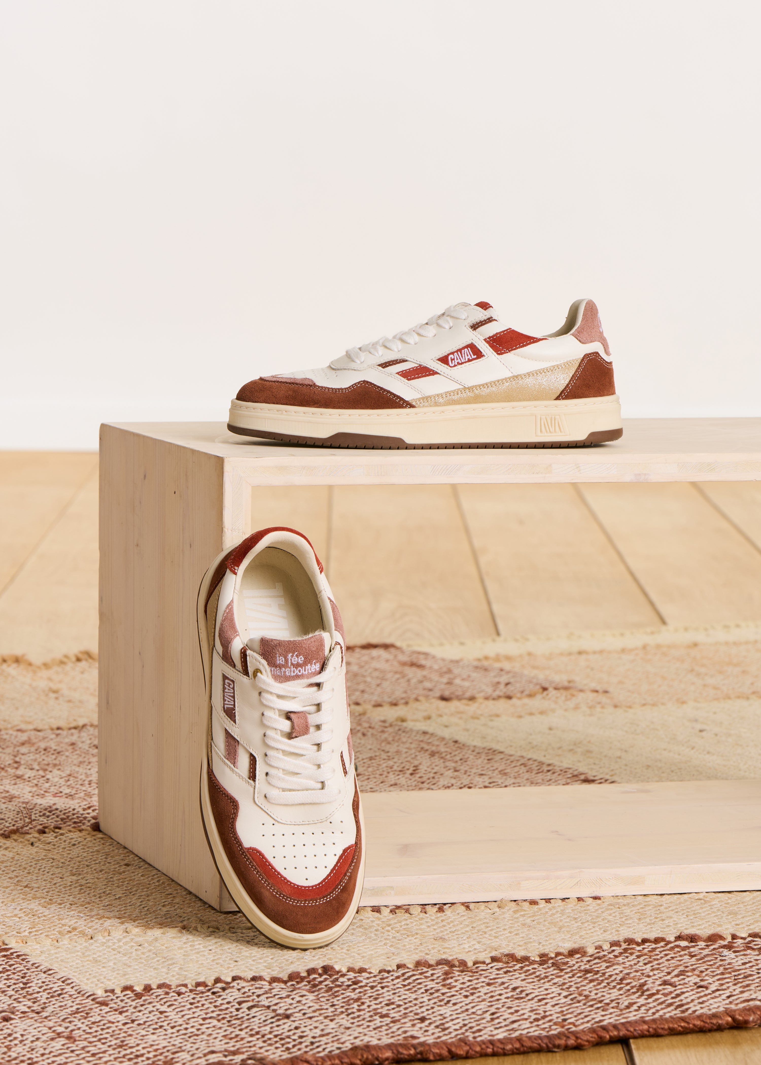 Red asymmetric trainers