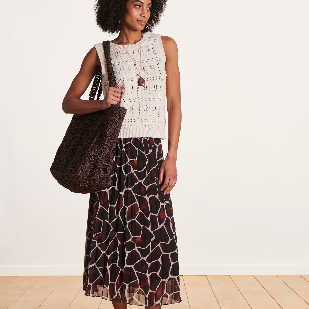 Pleated mid-length skirt in animal print voile La Fée Maraboutée