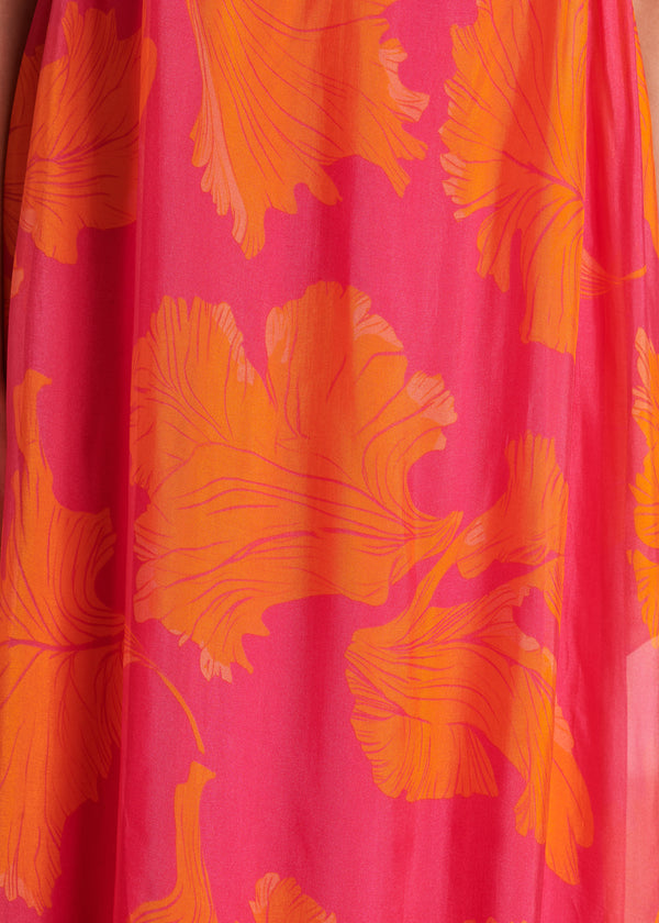 Robe longue ?�vas?�e en voile rose et orange imprim?� fleuri - La F?�e Marabout?�e
