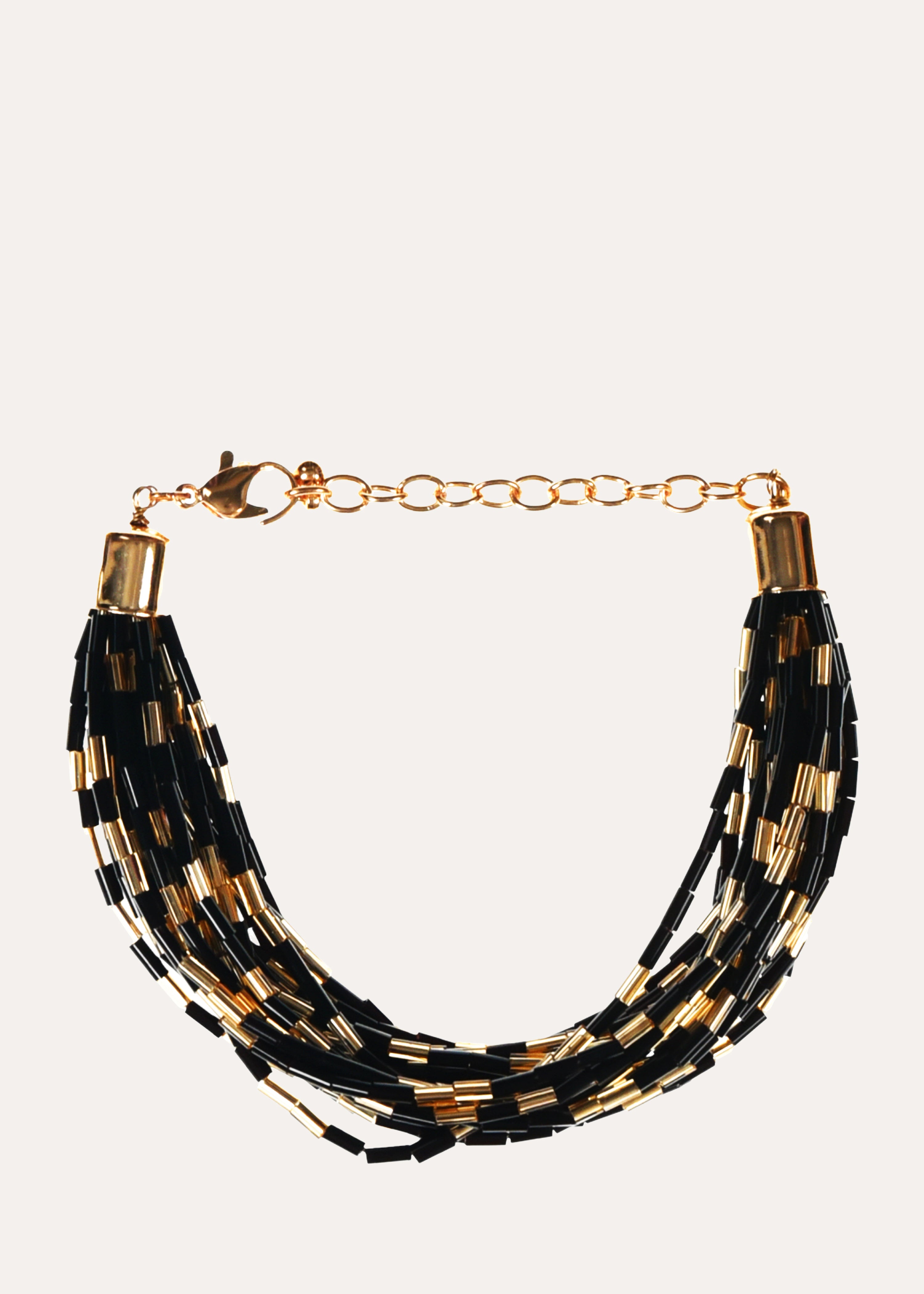 Zwart met gouden kralenarmband