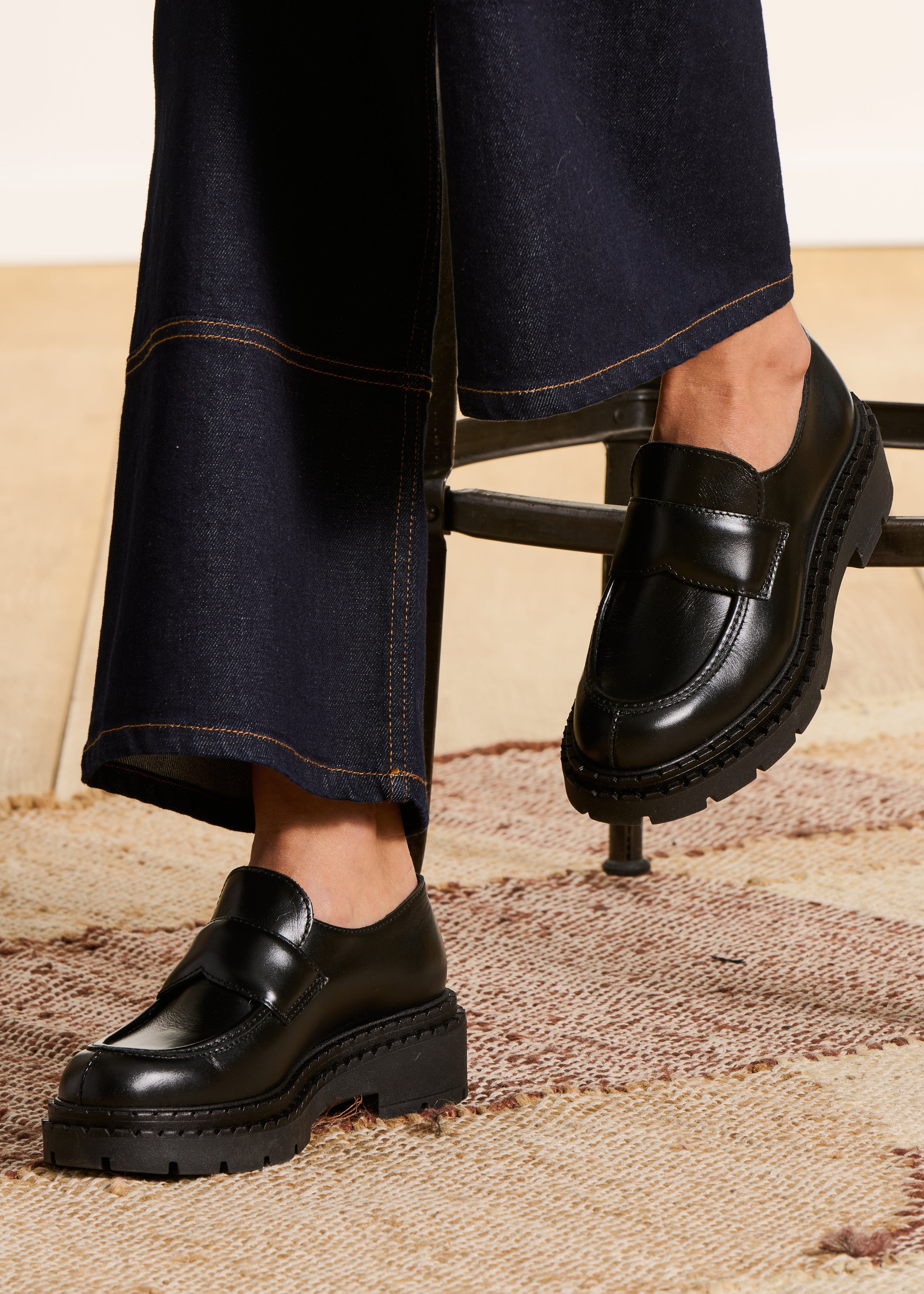 black leather mid-heel loafers