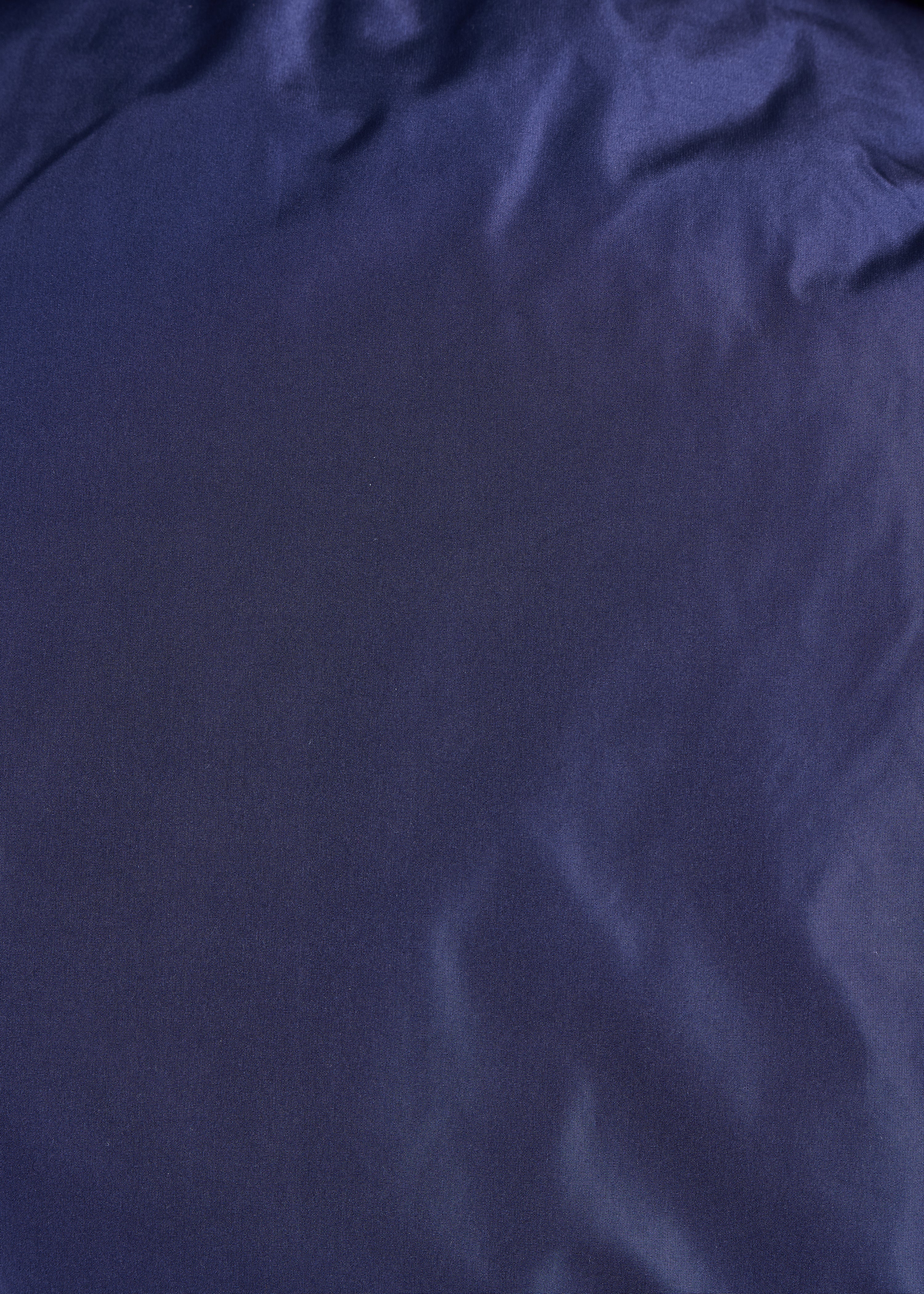 Capuche réversible beige et bleu