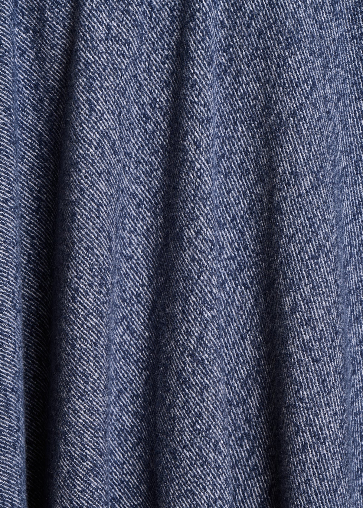 Blue denim poncho with fringes