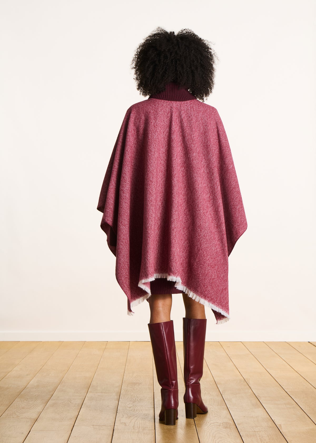 Poncho rouge à franges