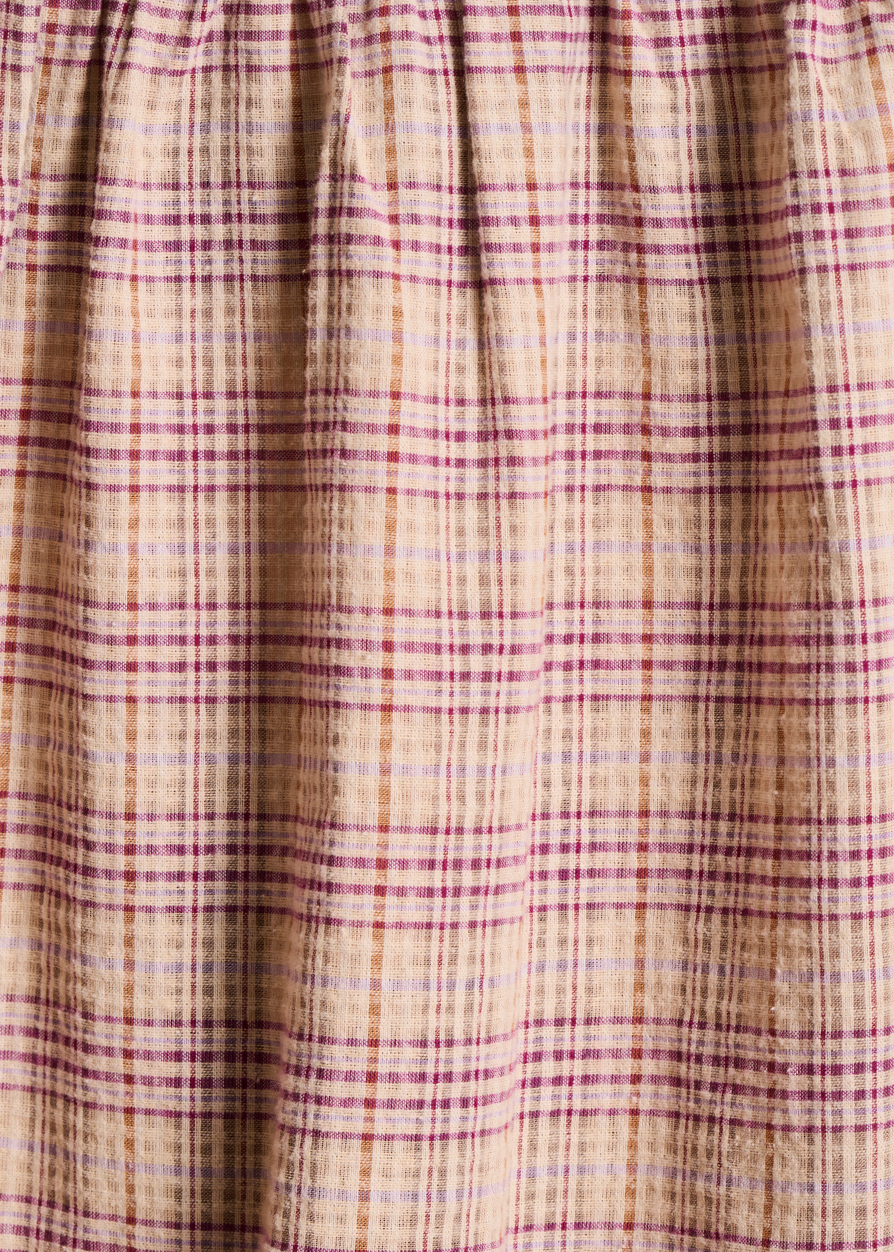 Chemise oversize beige et violet à carreaux