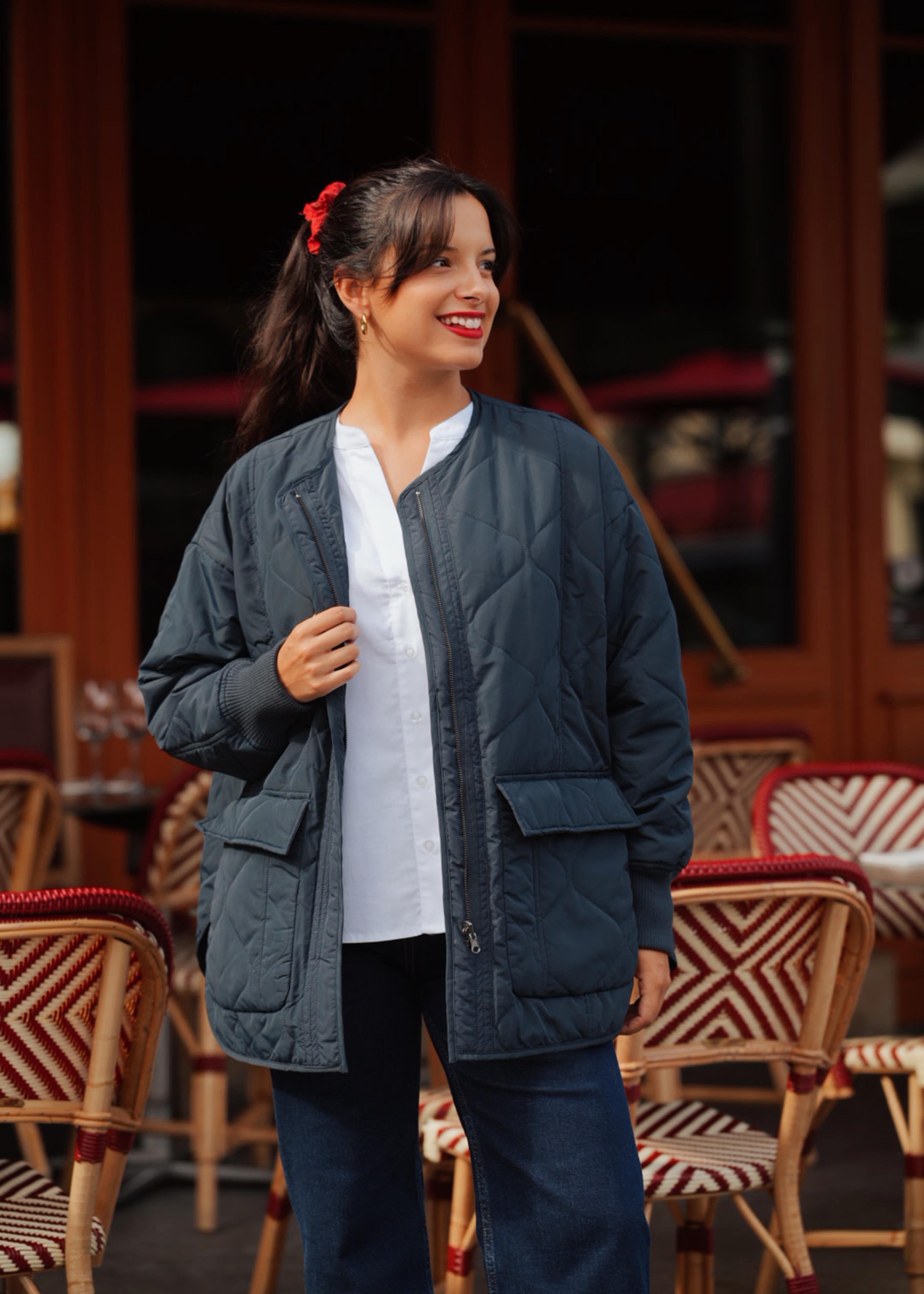 Piumino medio lungo blu scuro reversibile con cappuccio