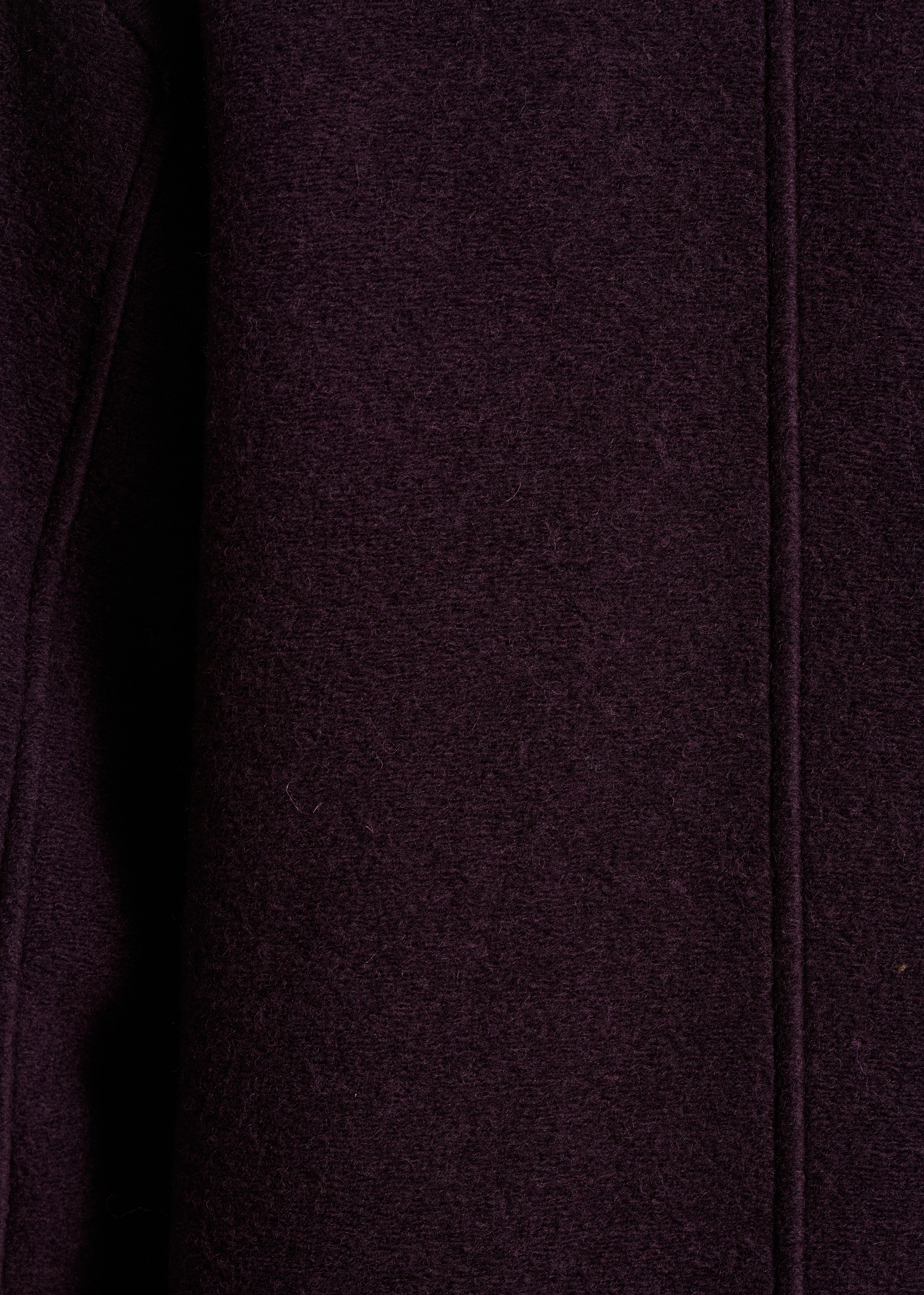Short plum coat in boiled wool knit