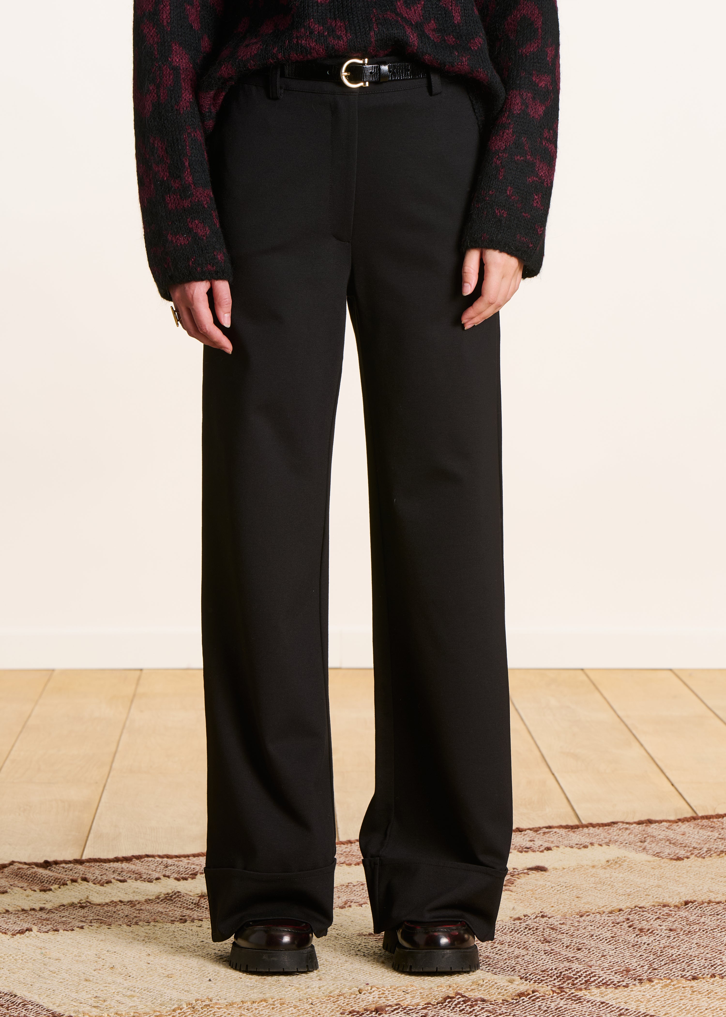 High-waisted black milano trousers