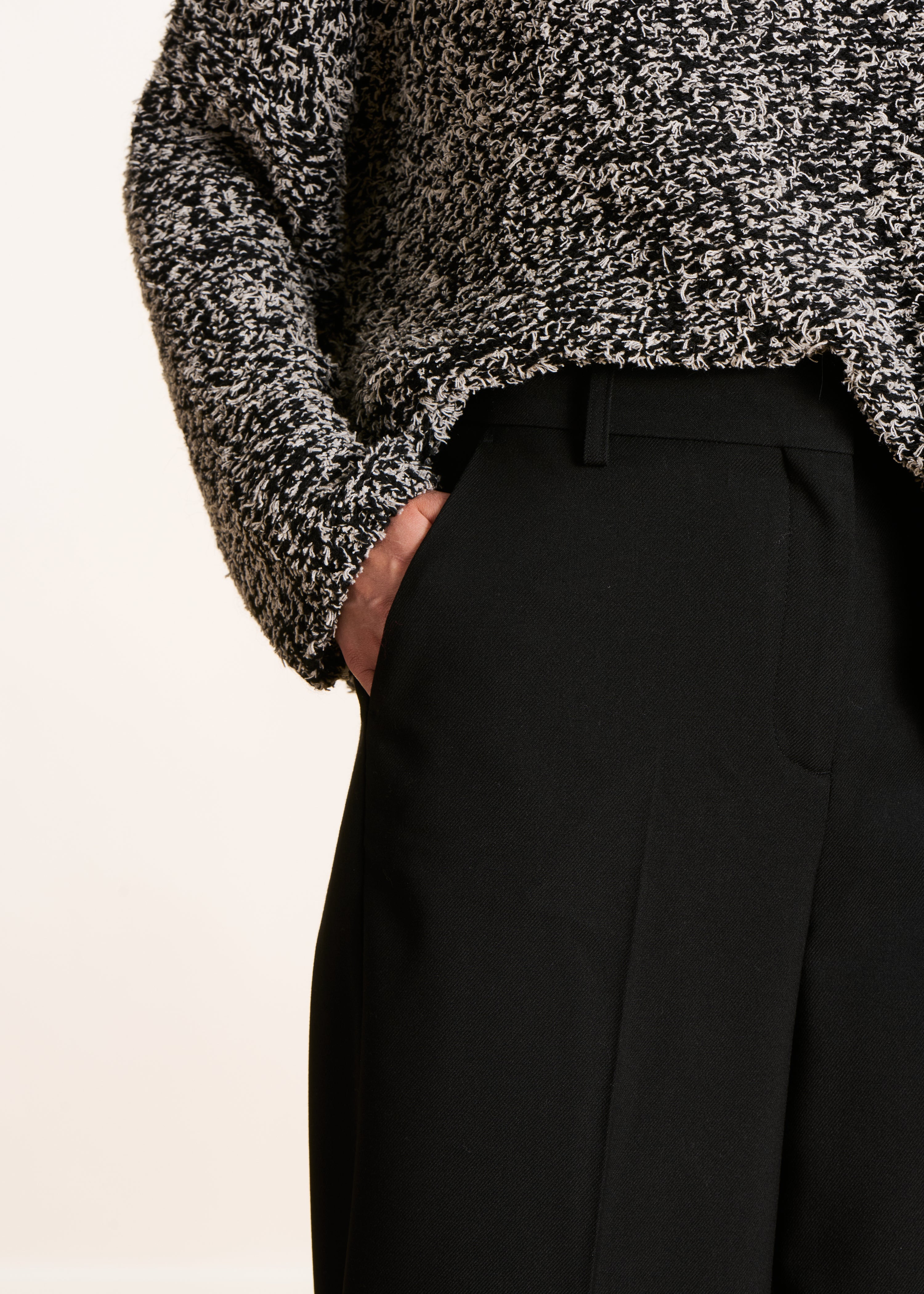 black high-waisted trousers