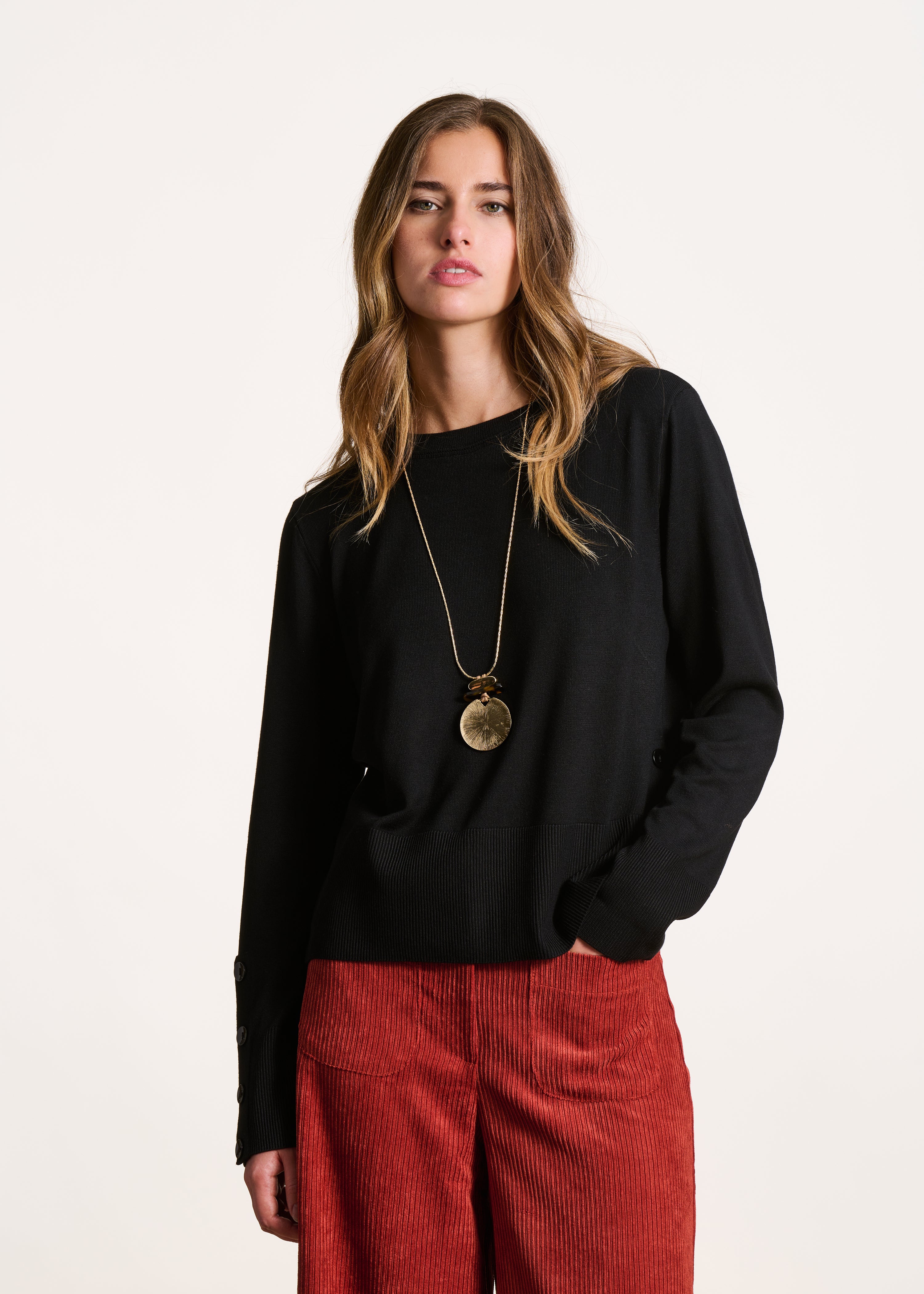 Pull noir manches longues col rond