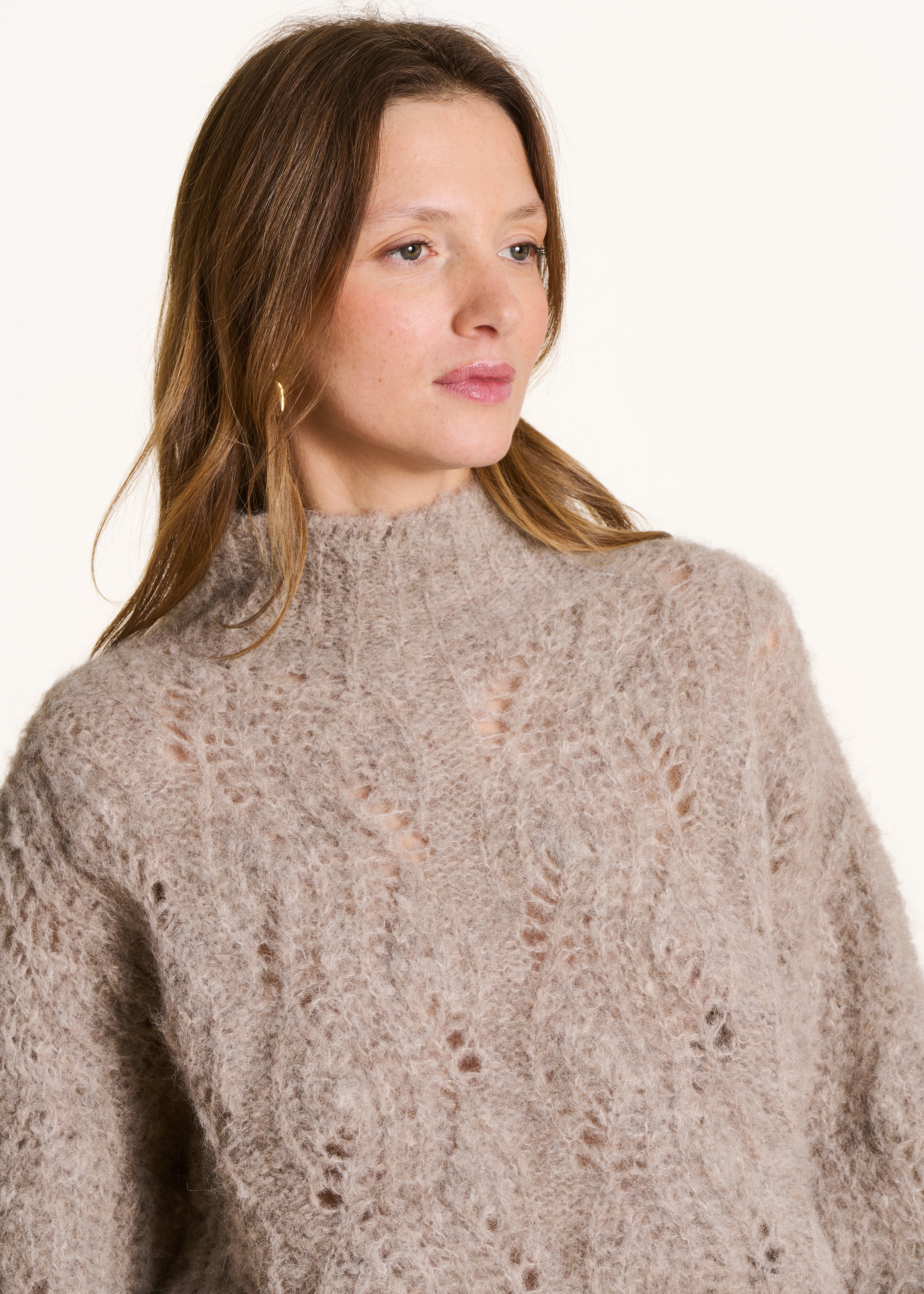 Beige openwork knit pullover with high collar