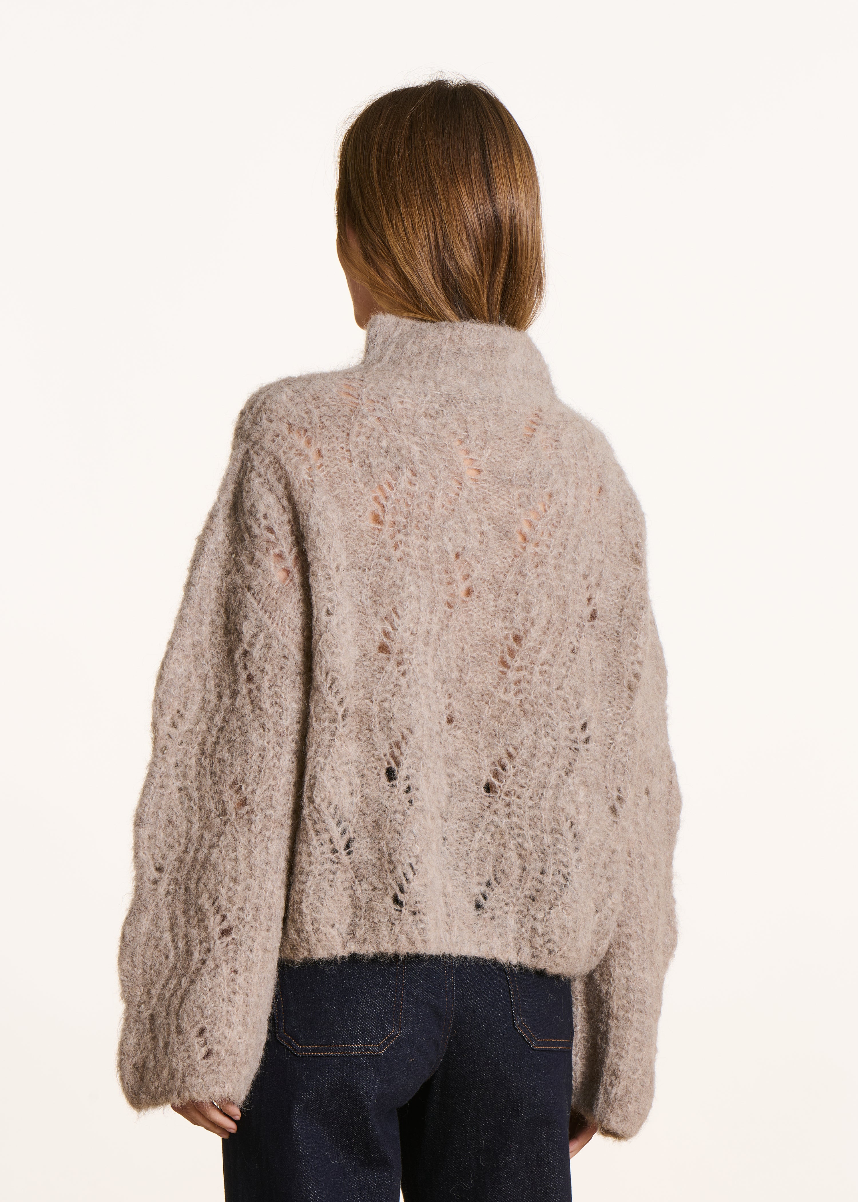 Beige openwork knit pullover with high collar