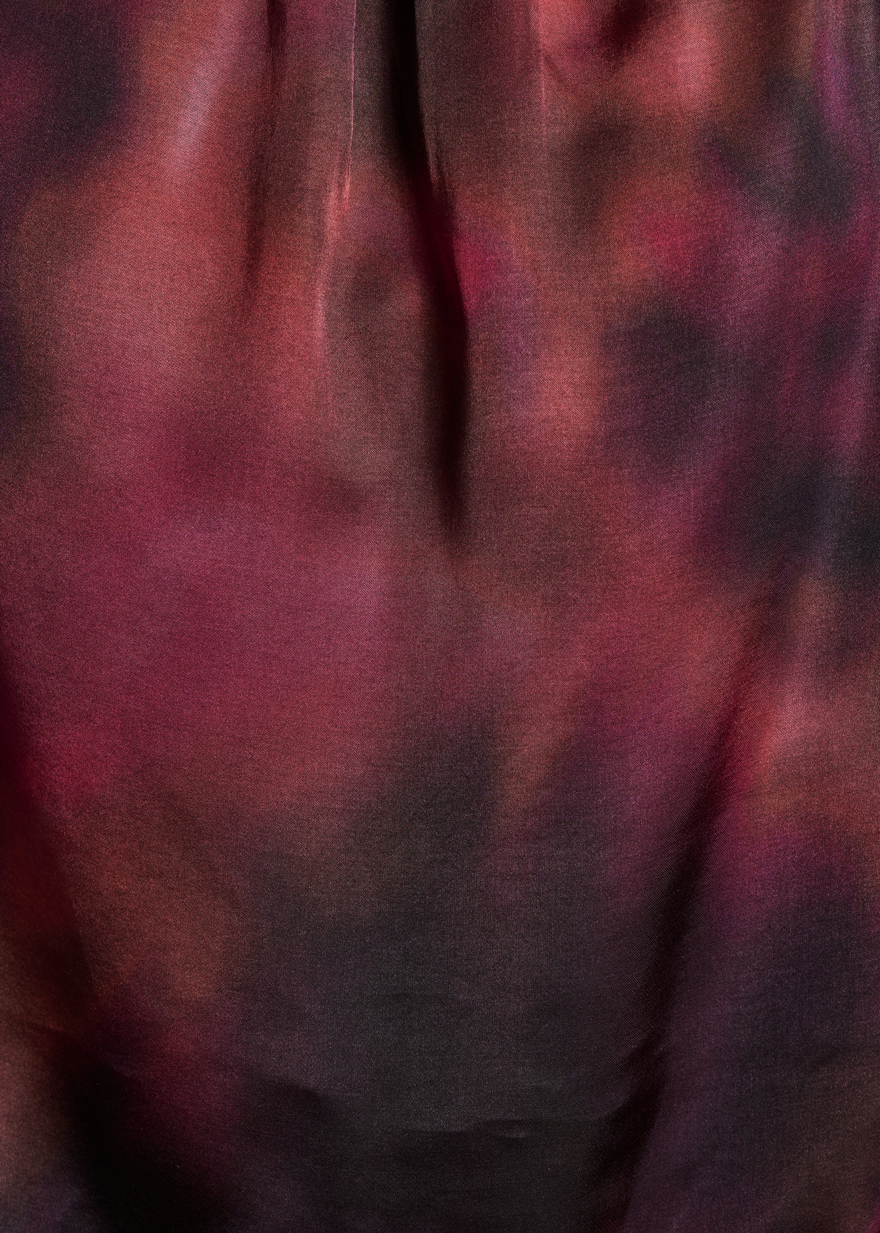 Red printed top with pussy bow collar