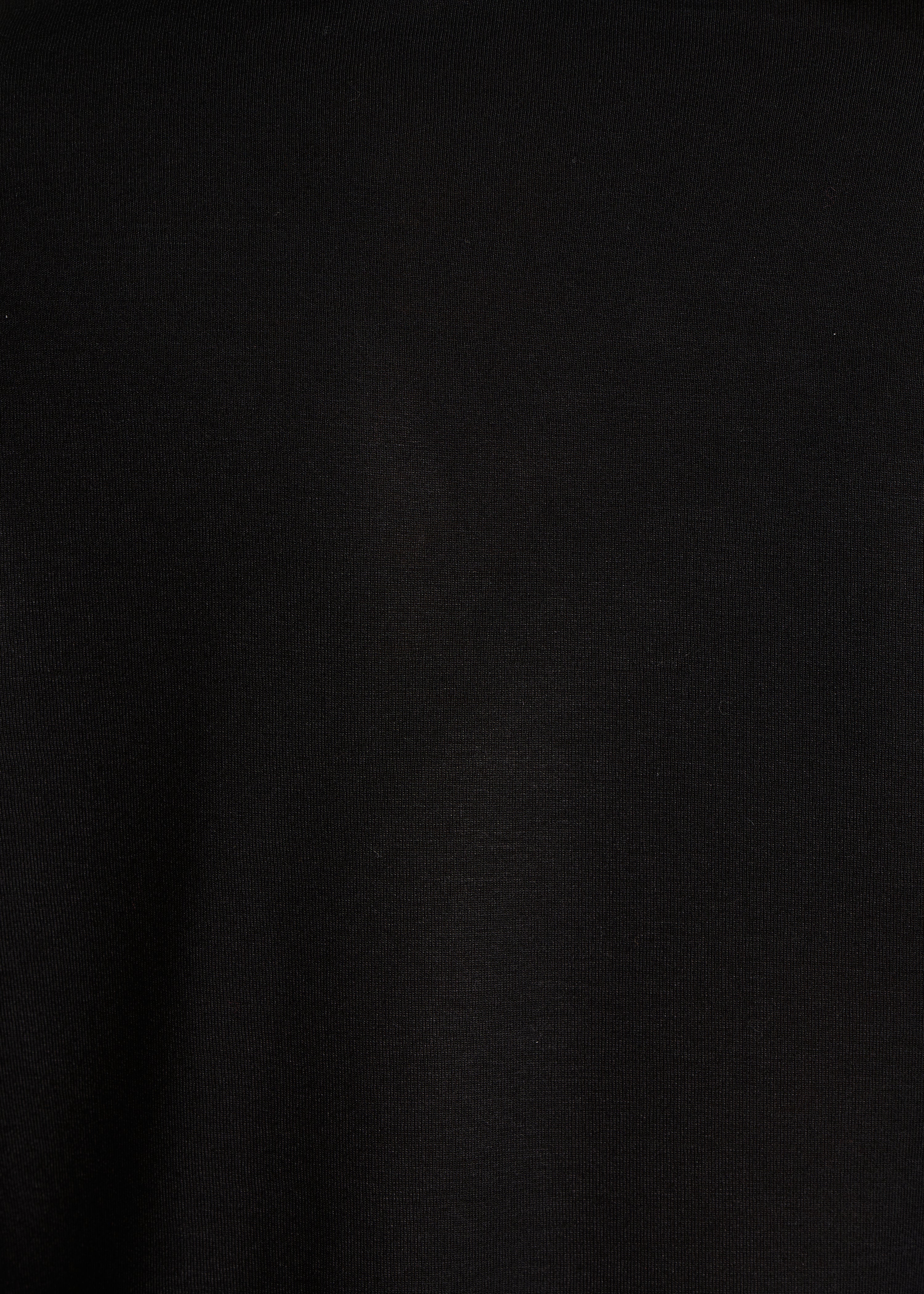 T-shirt noir fluide col asymétrique manches longues