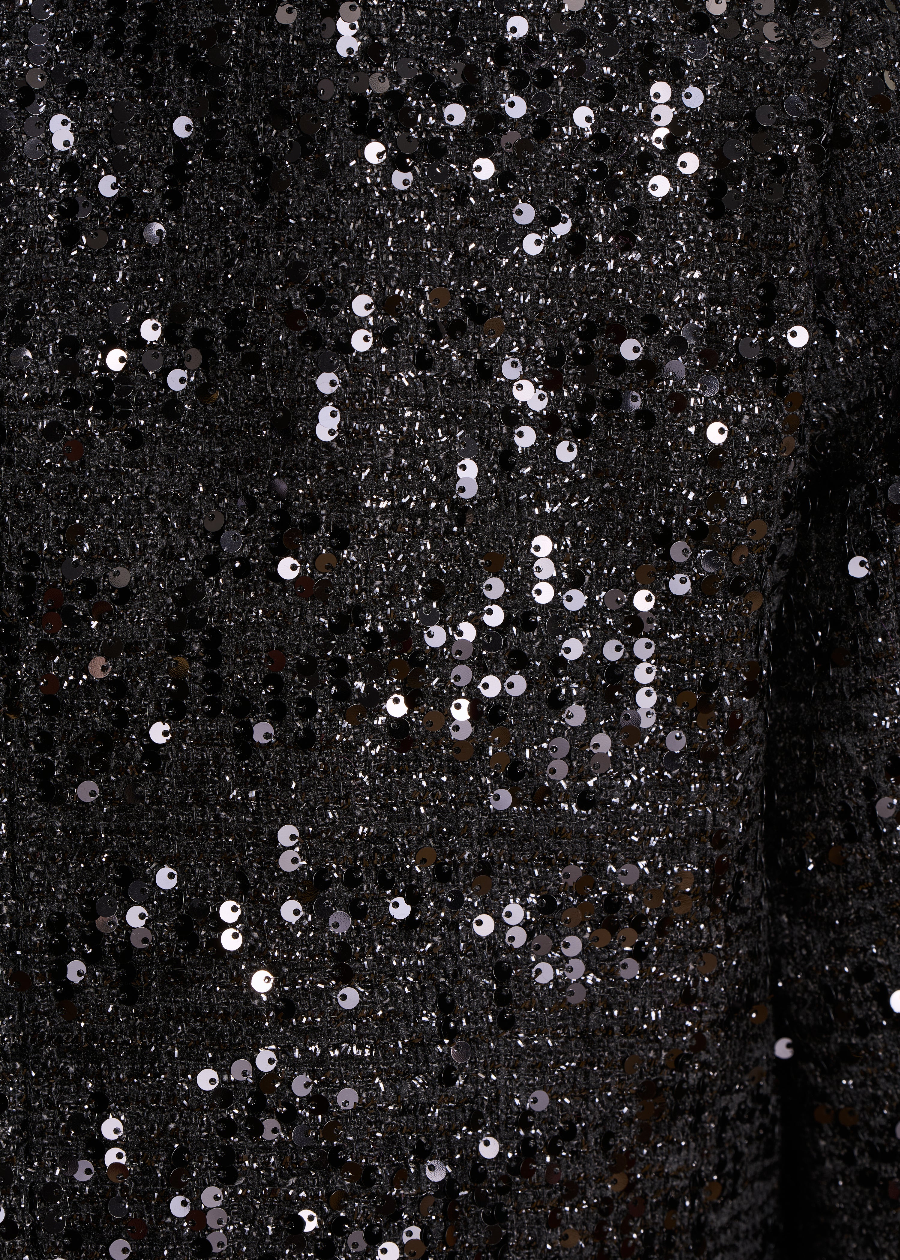 Veste courte noire à sequins