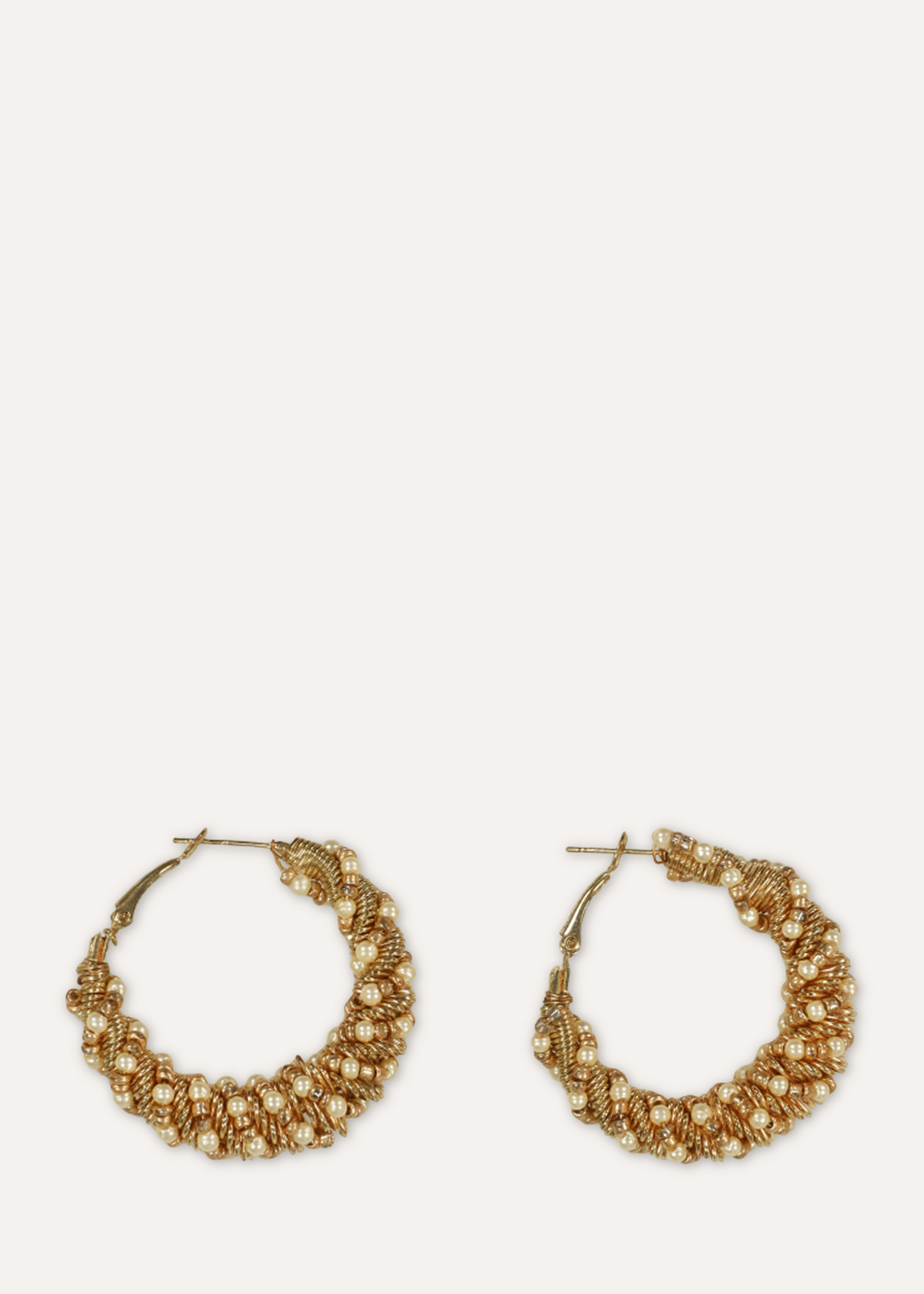 Golden hoop earrings with pearls