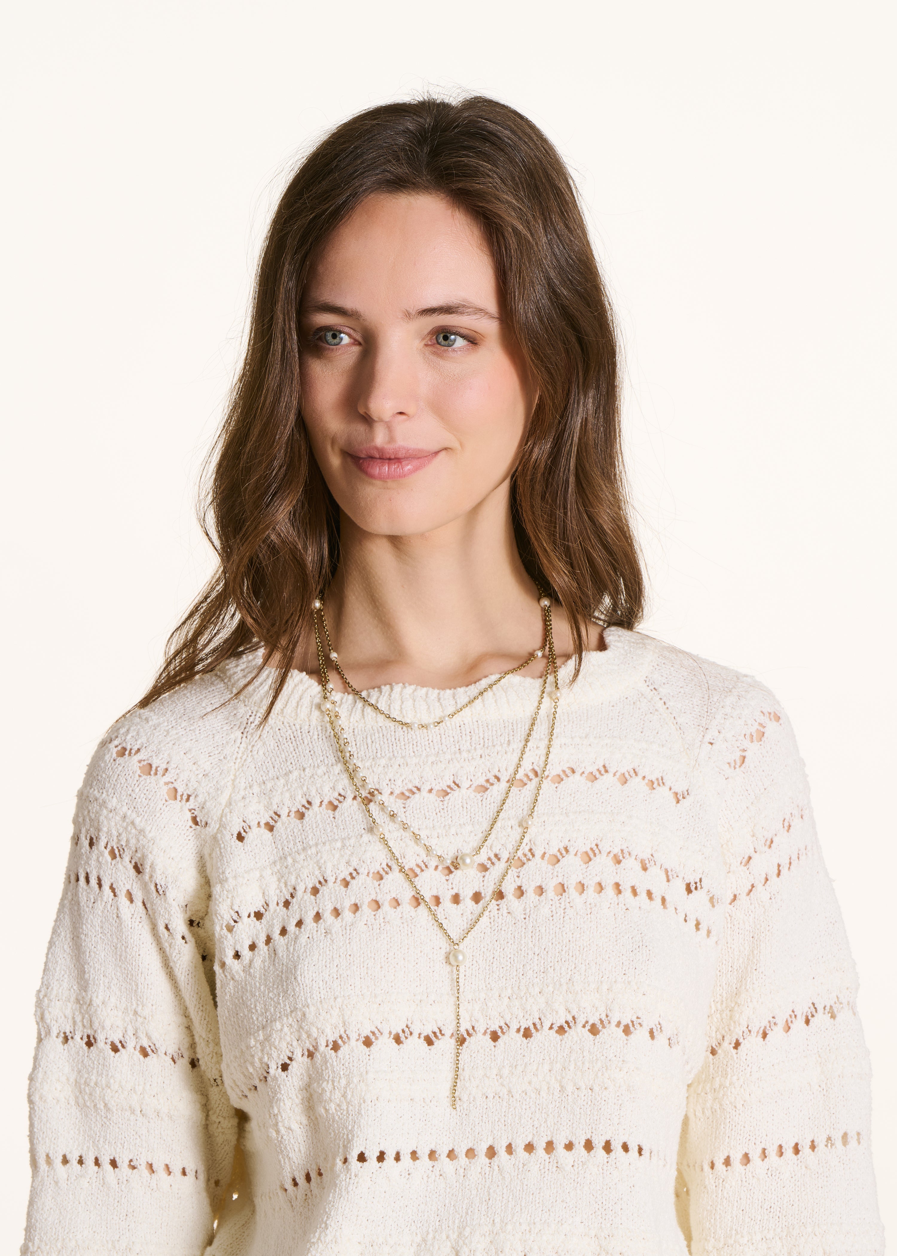 Gold multi-strand long necklace with mother-of-pearl beads