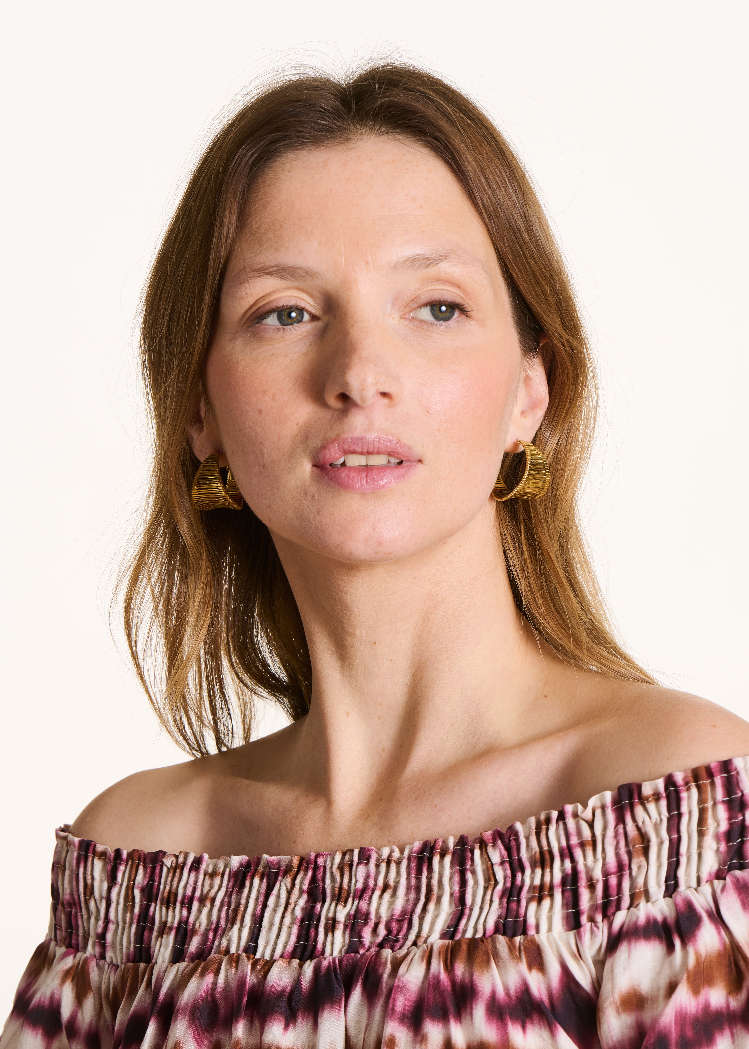 Goldene Creolen-Ohrringe