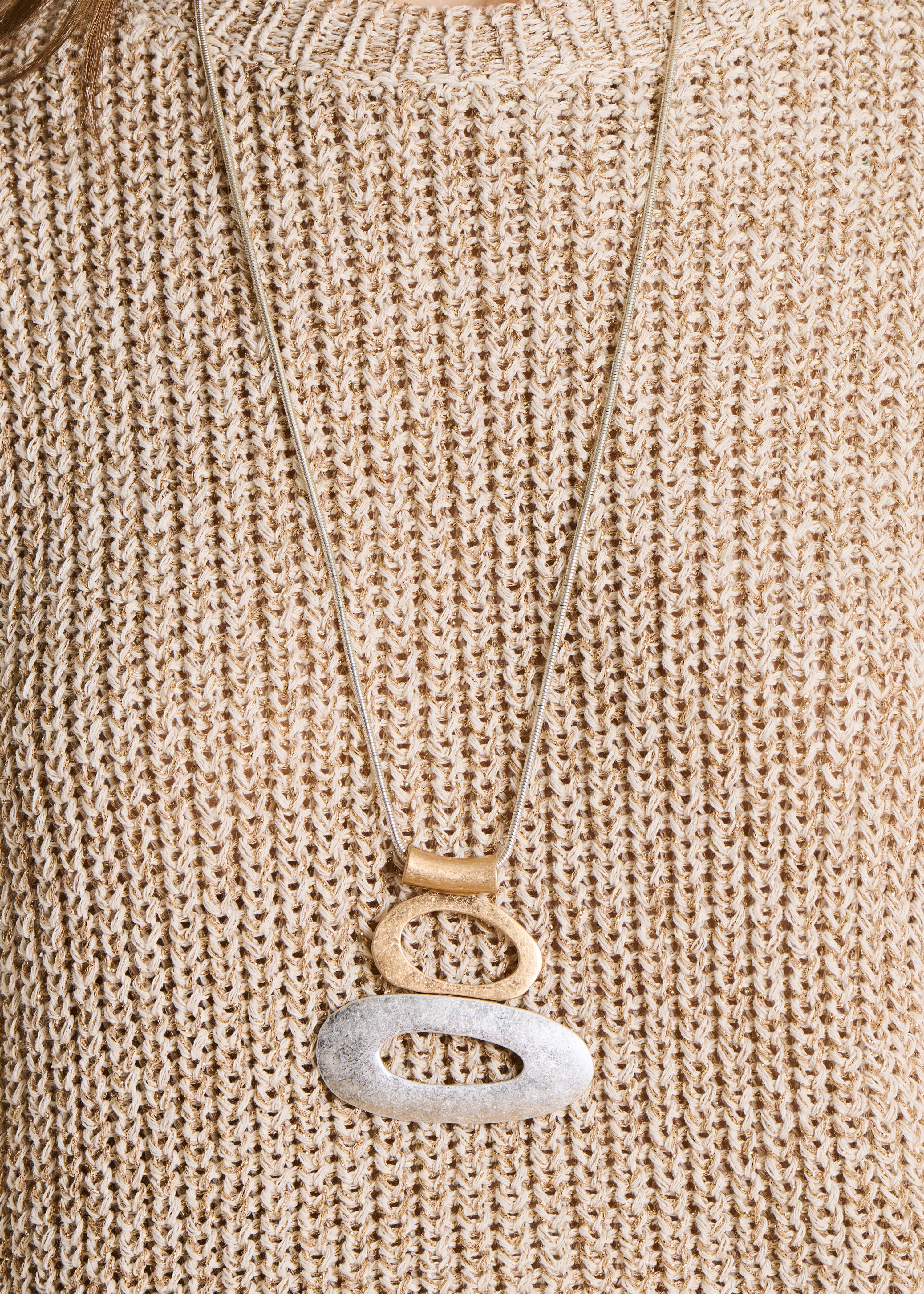 Goudkleurige en zilverkleurige lange ketting