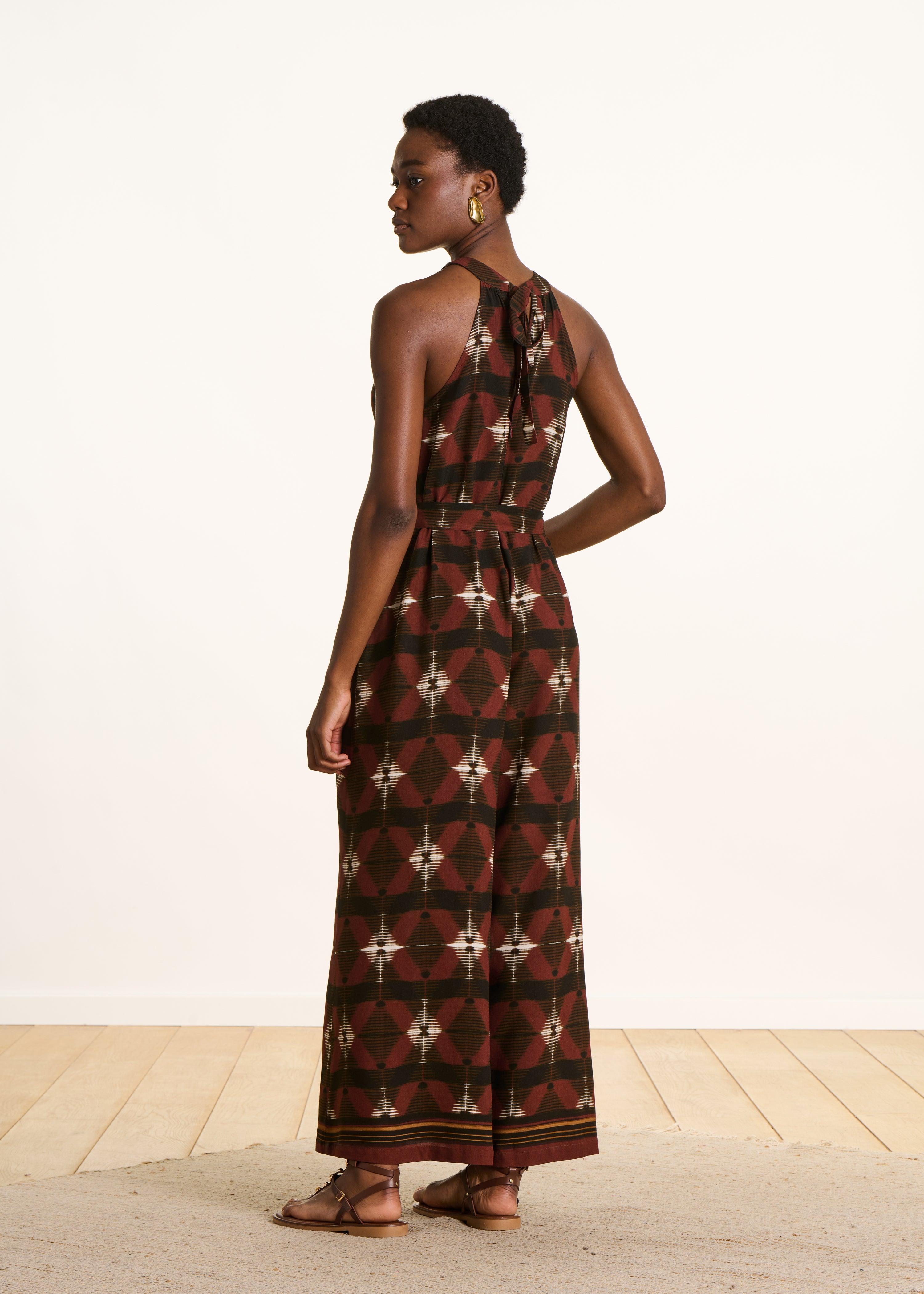 Wijde bruine jumpsuit met print