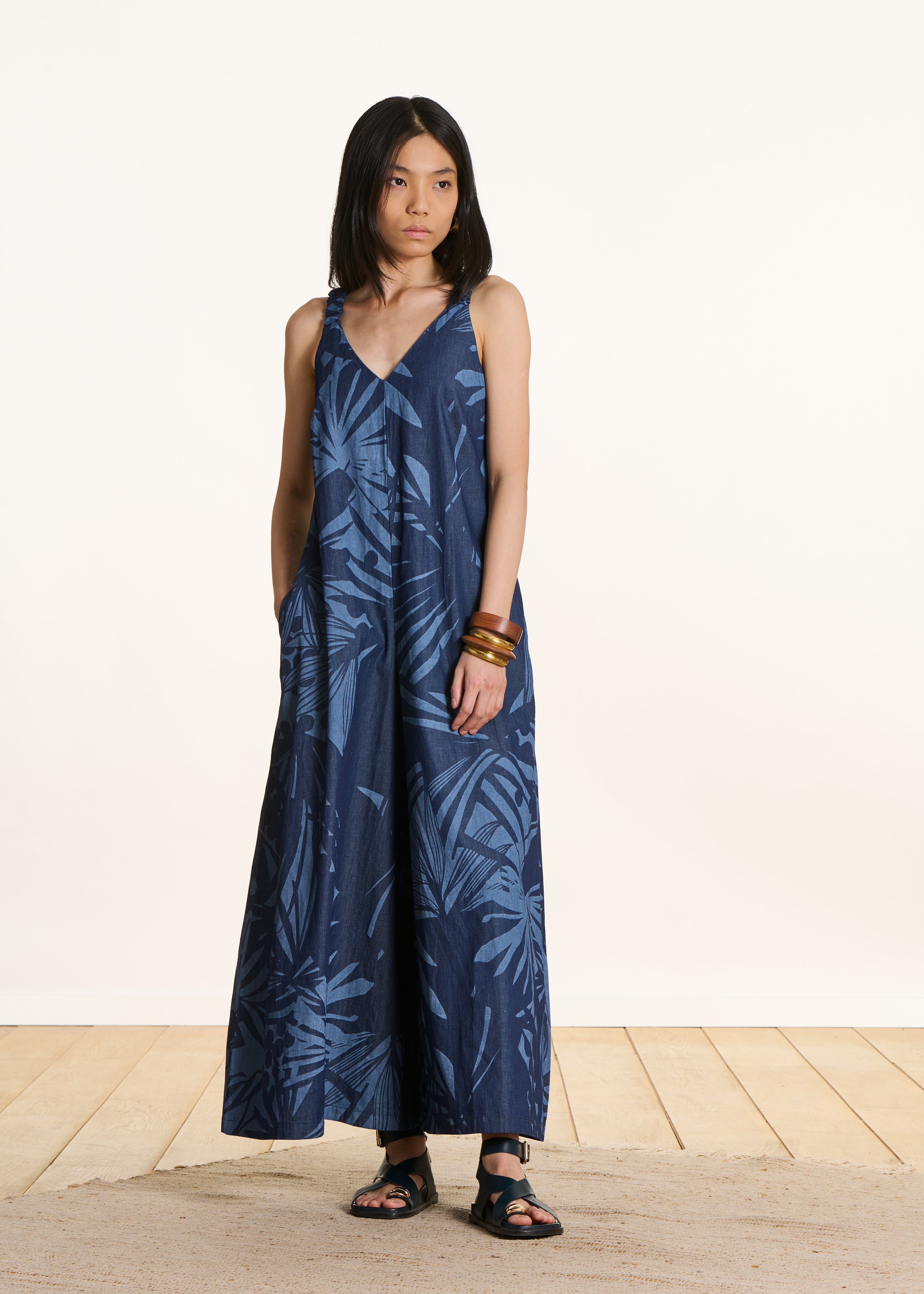 Navy blue cotton jumpsuit with straps and print
